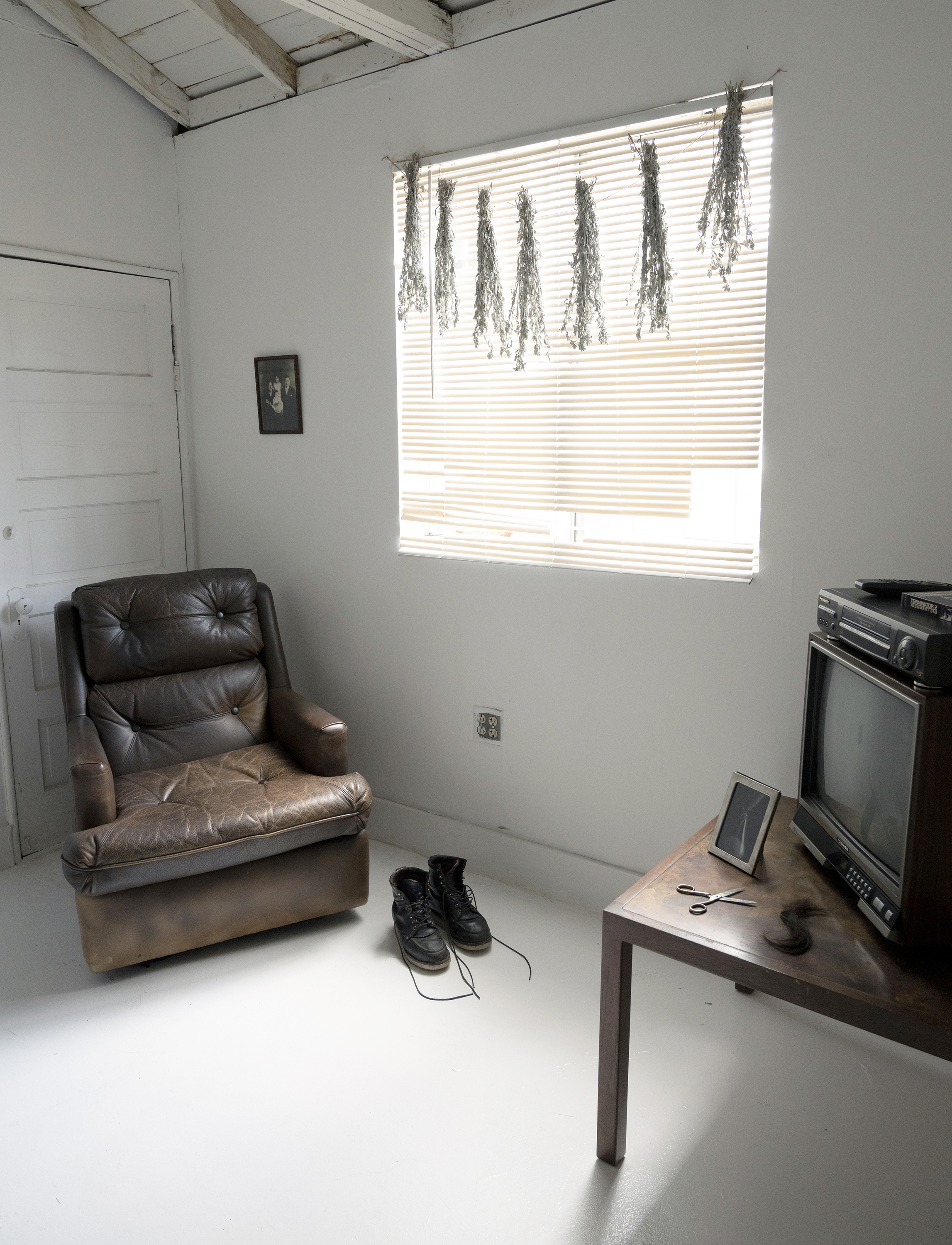 Fragments of Home, 5221 Monte Vista St, Los Angeles, California (2024). This site specific work reimagined a memory from my childhood home, and examined the contrast of energies within an urban family structure.