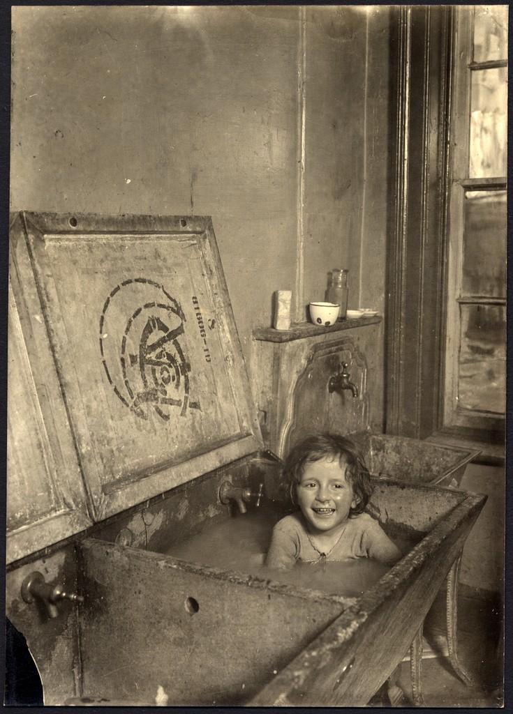 Lewis W. Hine. Child Bathing in Sink. Gelatin silver print. ca. 1910.