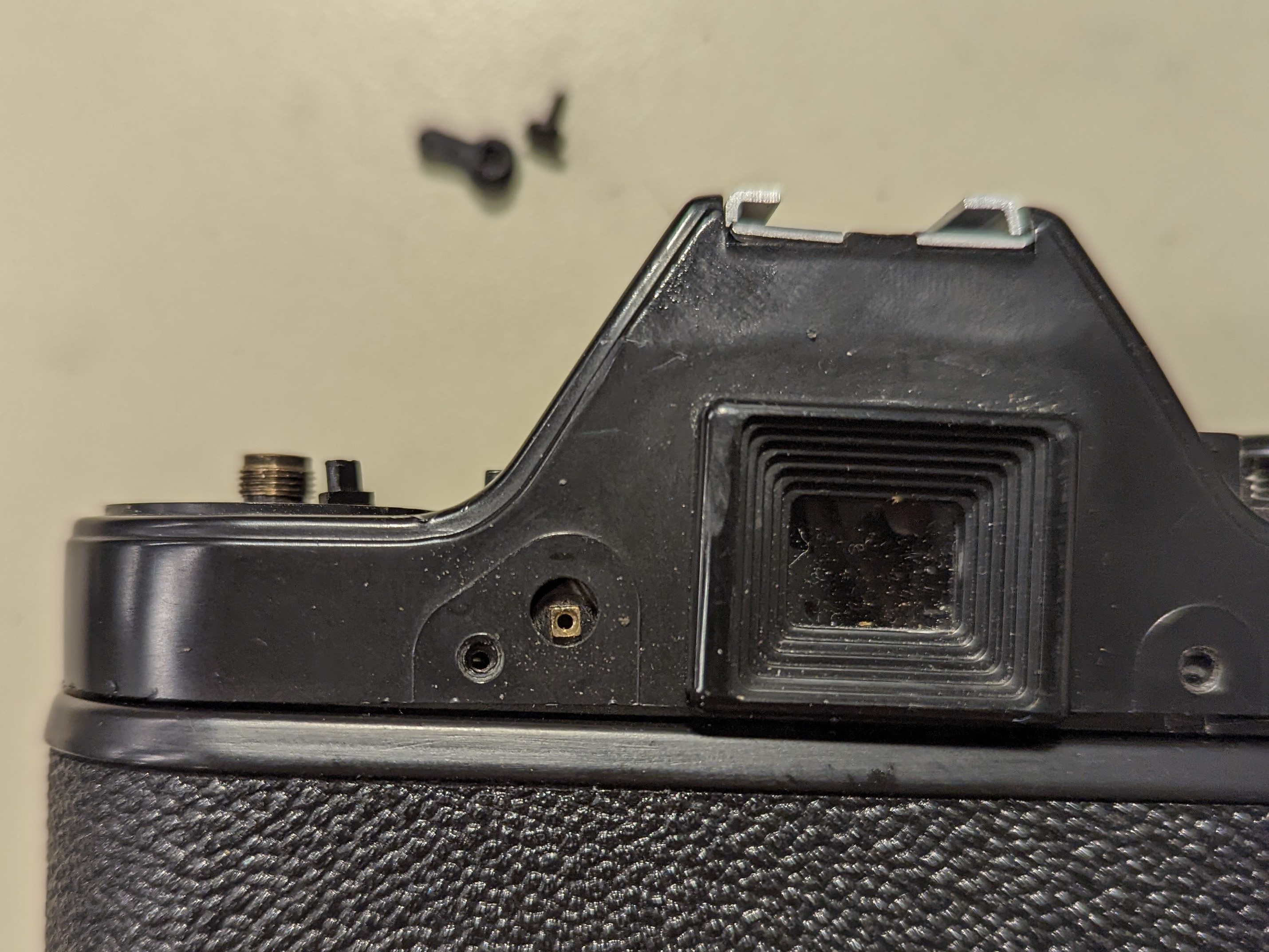 11. Prism shield lever removed.
