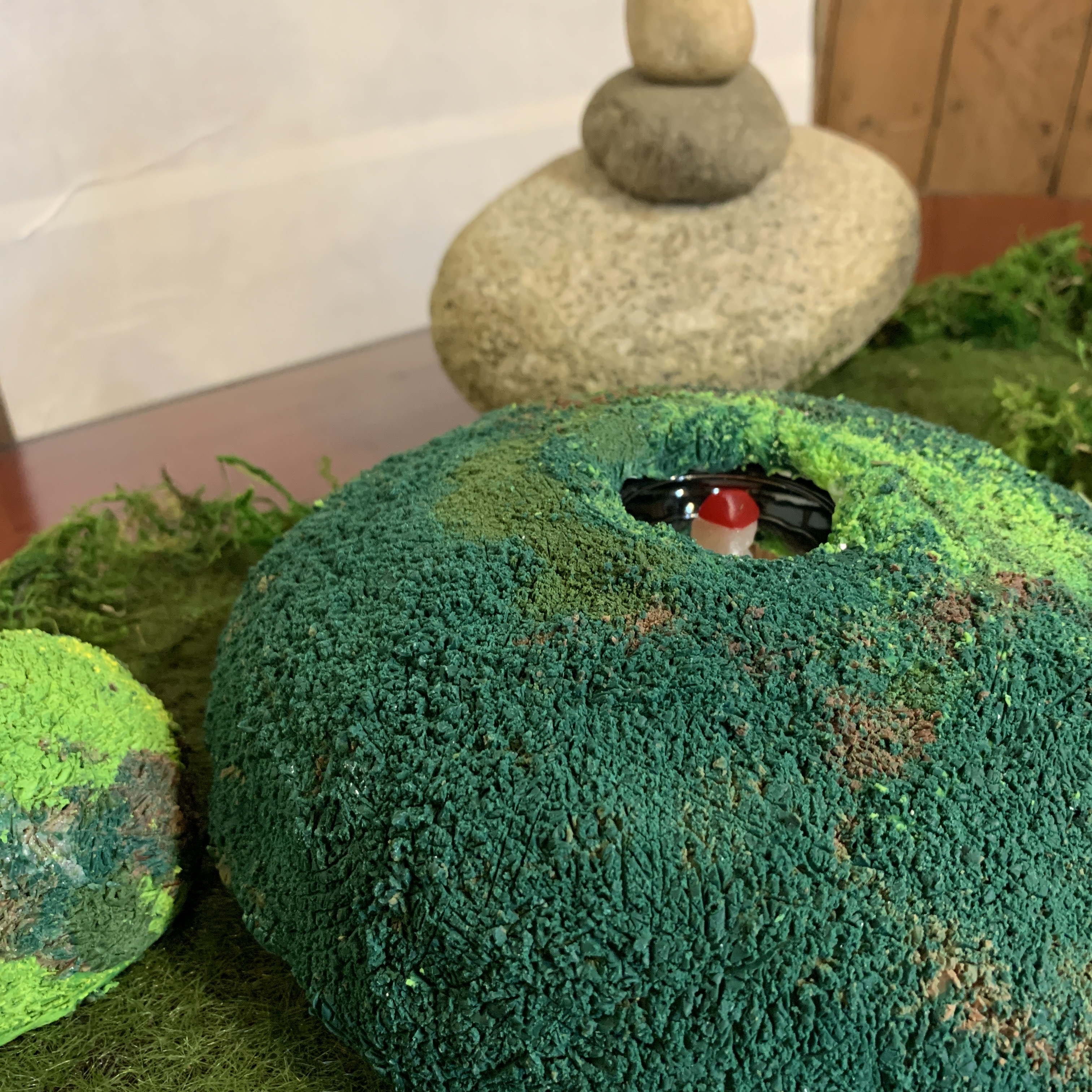 Installation views of Stone from I Wish My Home was Here series2022Polymer clay, mirror, artificial moss, plastic toy, wood, stoneSize variable