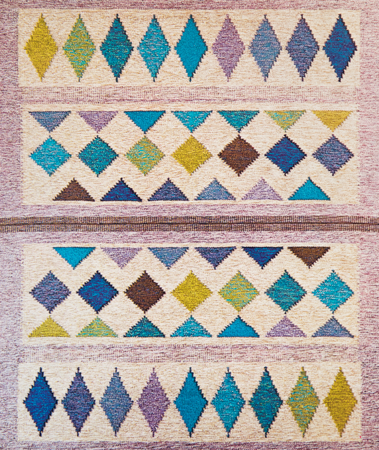 Handwoven wool rug. Serial production. 1980's