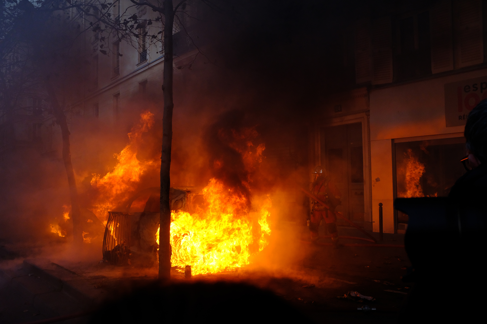Philippe-Sarfati-reportage-photography-photographer-street-documentary-photojournalism-photojournalist-paris-france-securite-globale-demonstration-fire-fireman-dark-smoke-exploded-car