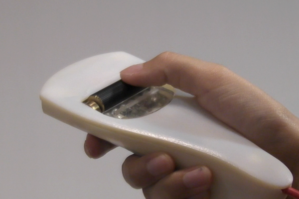 TouchRoller: A Touch-sensitive Cylindrical Input Device for GUI Manipulation of Interactive TVs