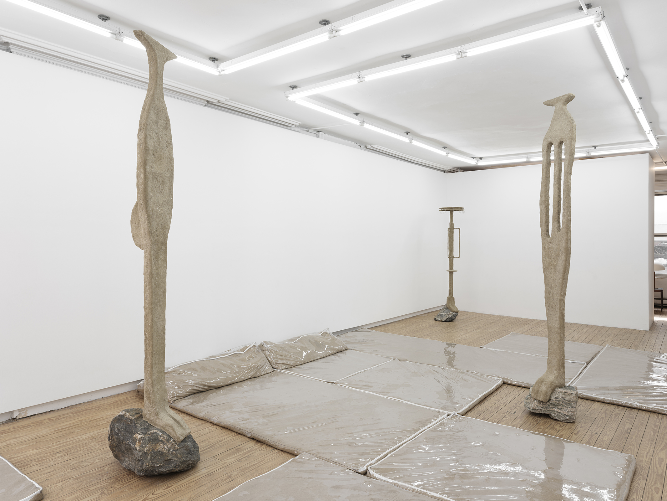 Lone And Level, 2021, vinyl, sand, polymer, burlap, steel, rock, shower curtain hooks