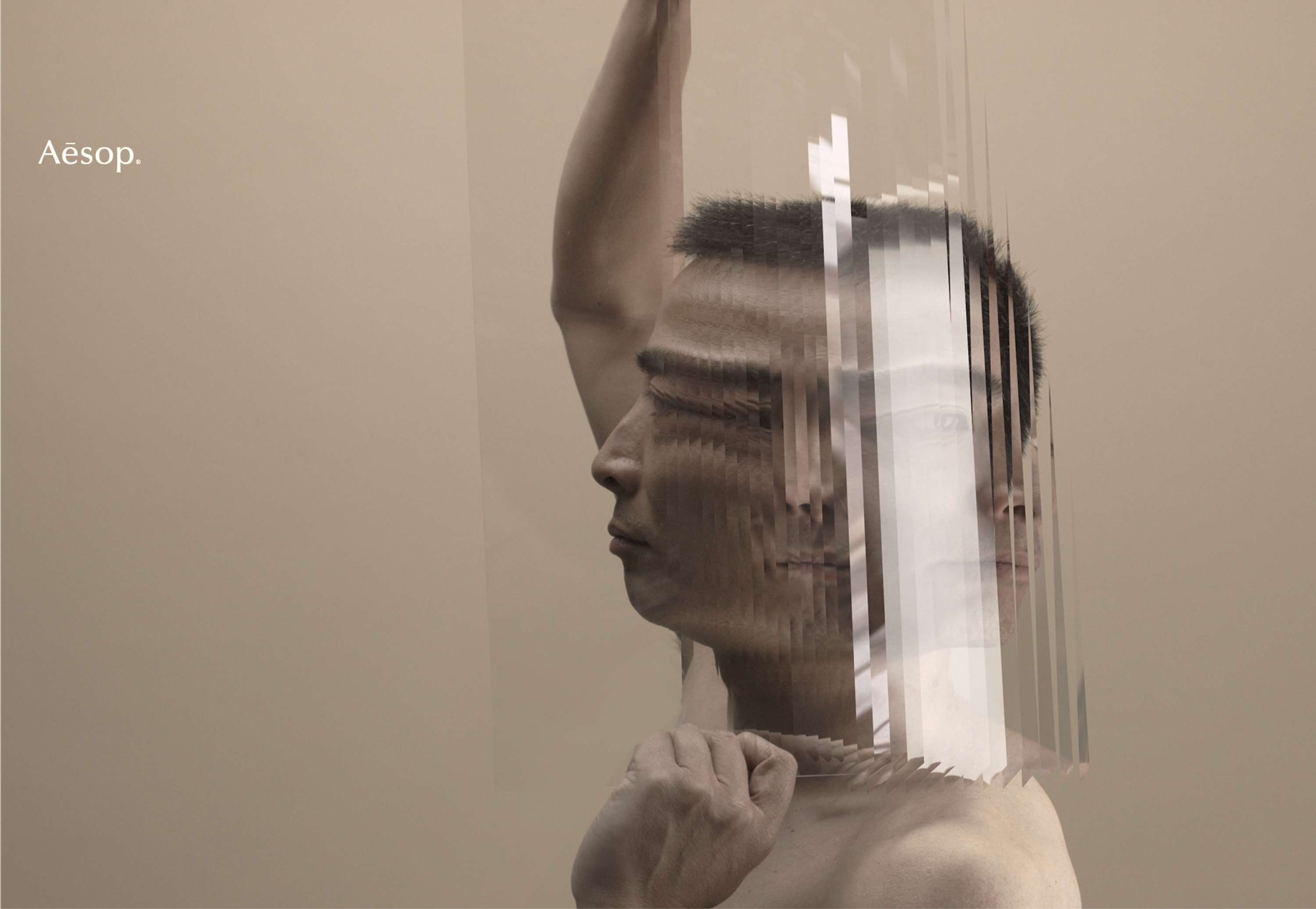 A man's face is obscured, mirrored, and refracted by transparent PVC; a digitally manipulated image by Bart Hess.