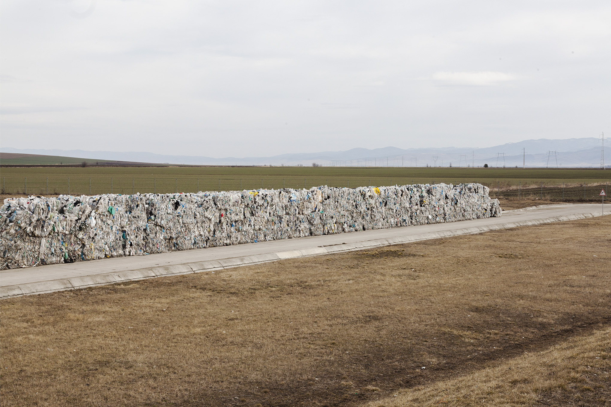 Moacșa, Covasna County (Romania) Recovered recyclable materials are being stored at the landfill facility. Depending on the market fluctuations of offer and demand for recycled products, the companies storing these renewable materials wait for the right moment to sell them for a minimum price.