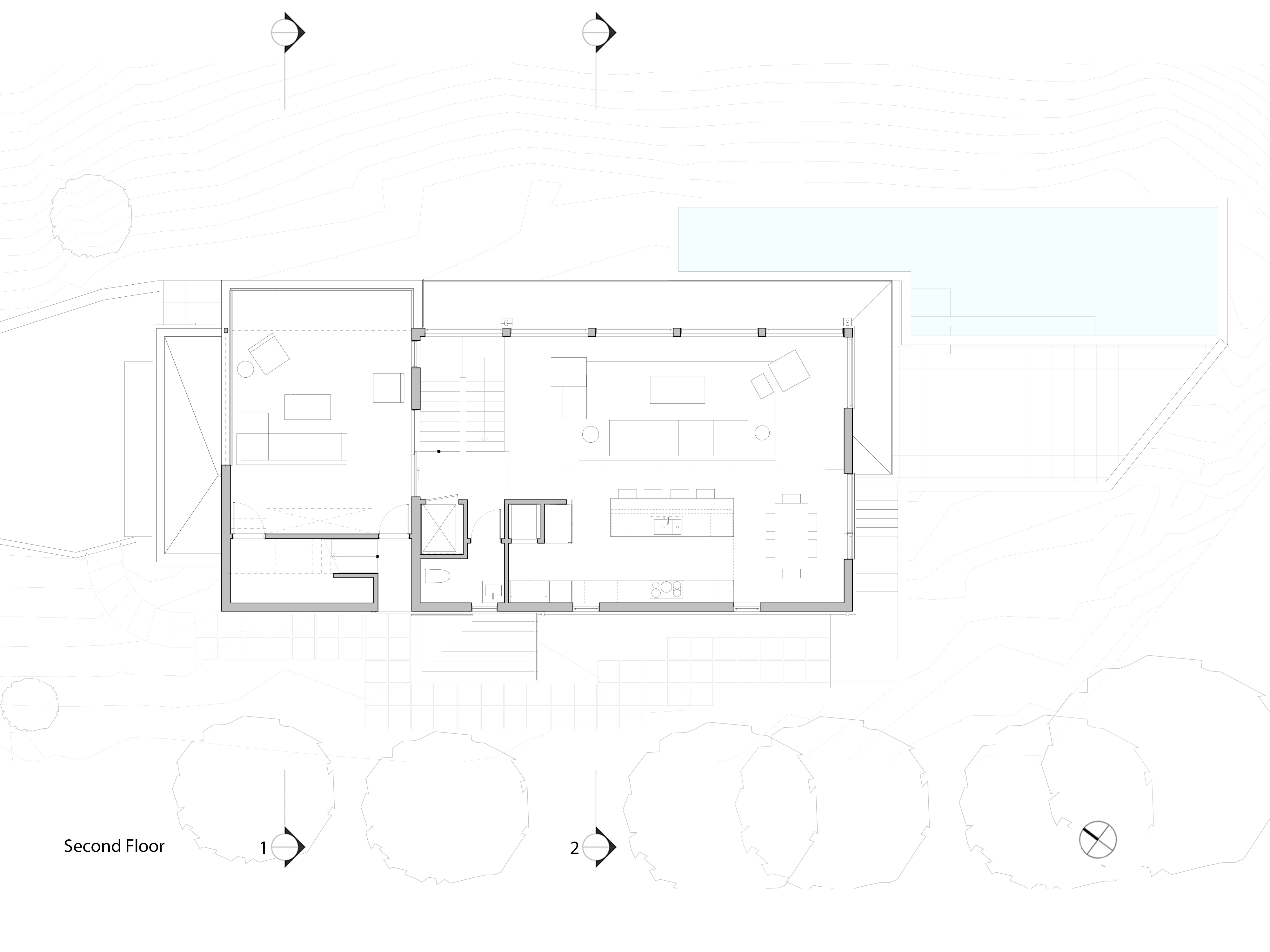 Architectural second floor plan of the Two Hill residence, illustrating the spacious open layout of the main living, dining, and kitchen areas, with large windows positioned for the bay view and access to the exterior deck.
