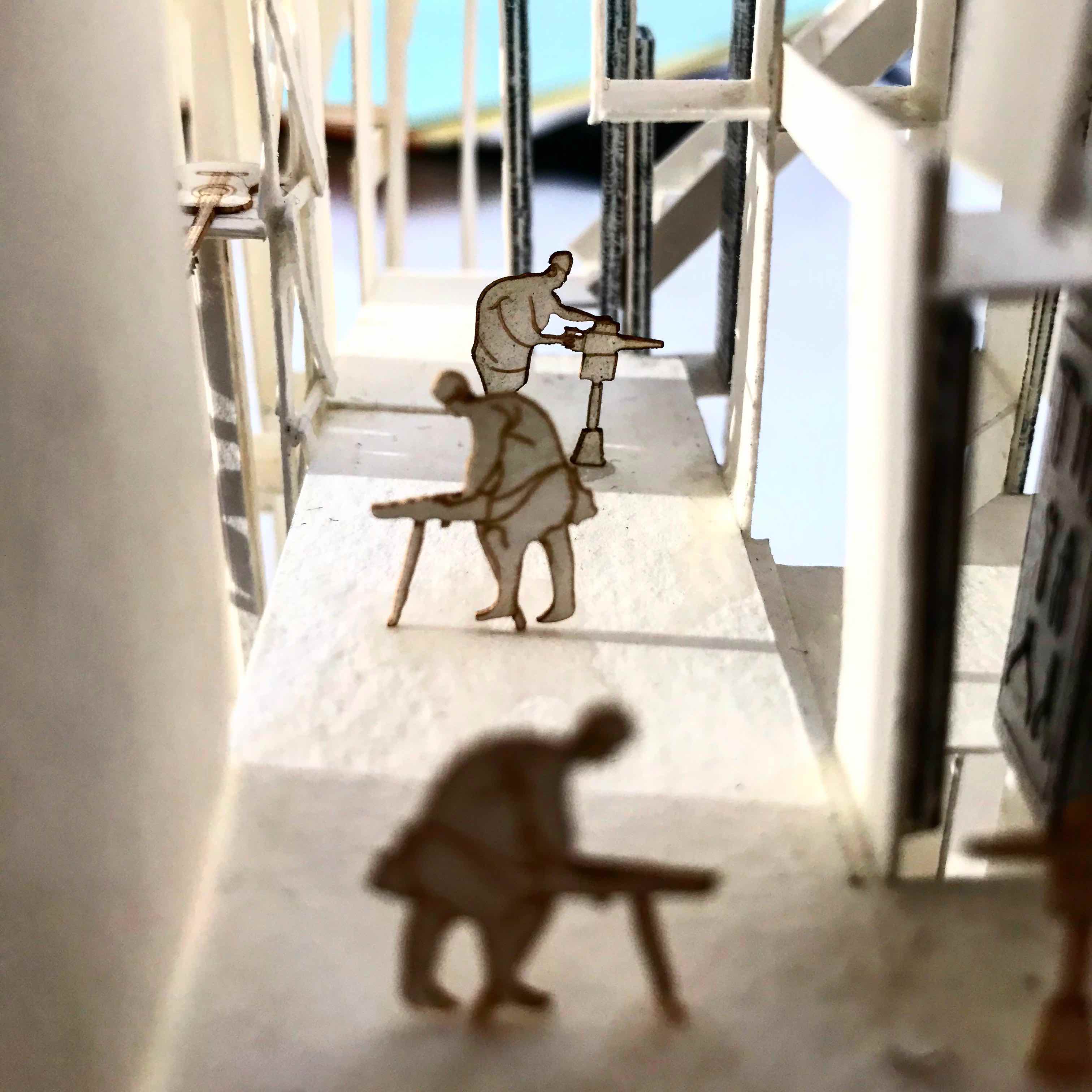 Musical instrument repair workshop workers