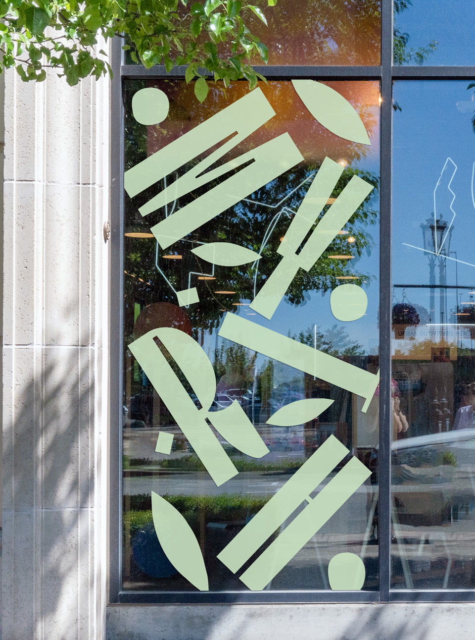 Myrth Restaurant logo design on restaurant window.
