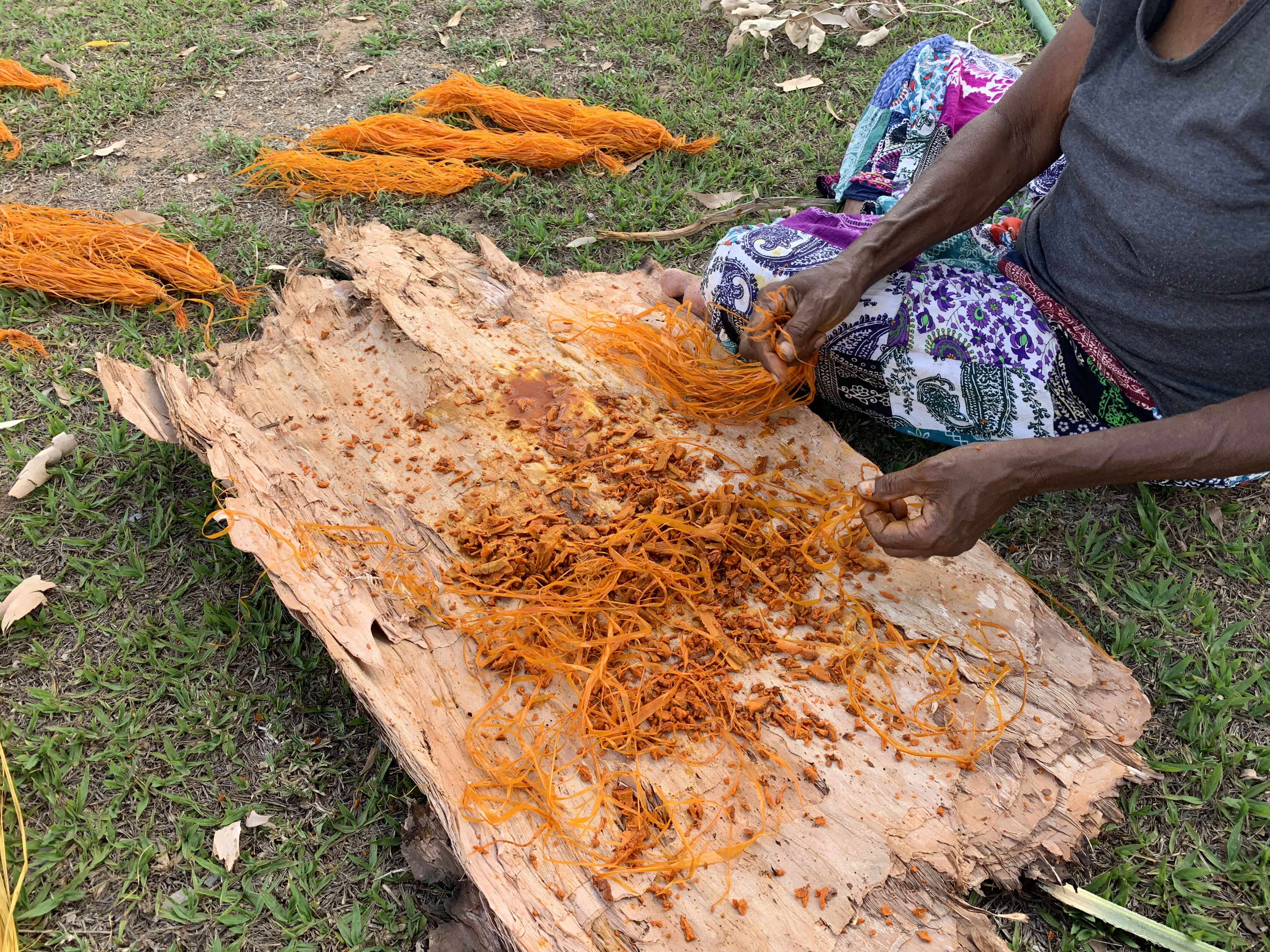 Regina Pilawuk Wilson working with merrepen (sandpalm) fibres. Durrmu Arts Aboriginal Corporation, Peppimenarti, Northern Territory, Australia. September 2019. Photo Miriam La Rosa.
