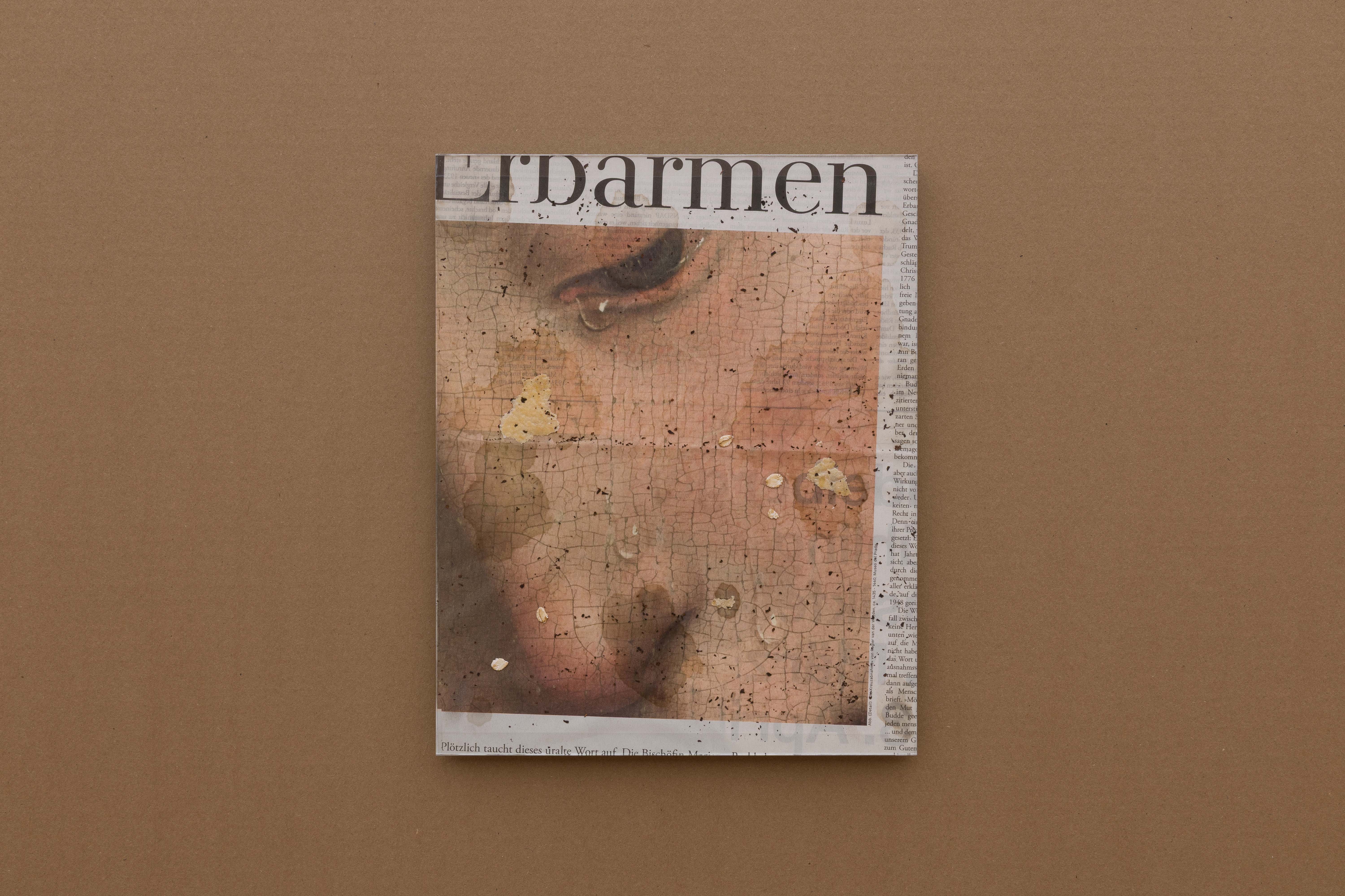 Mercy (Leak), 2025. Black tea leaves, butter, croissant, and oats on newspaper (Die Zeit, January 30, 2025), Artglass AR 99 Water White, acid free board, tape on Dibond, stainless steel. 30 x 24 cm