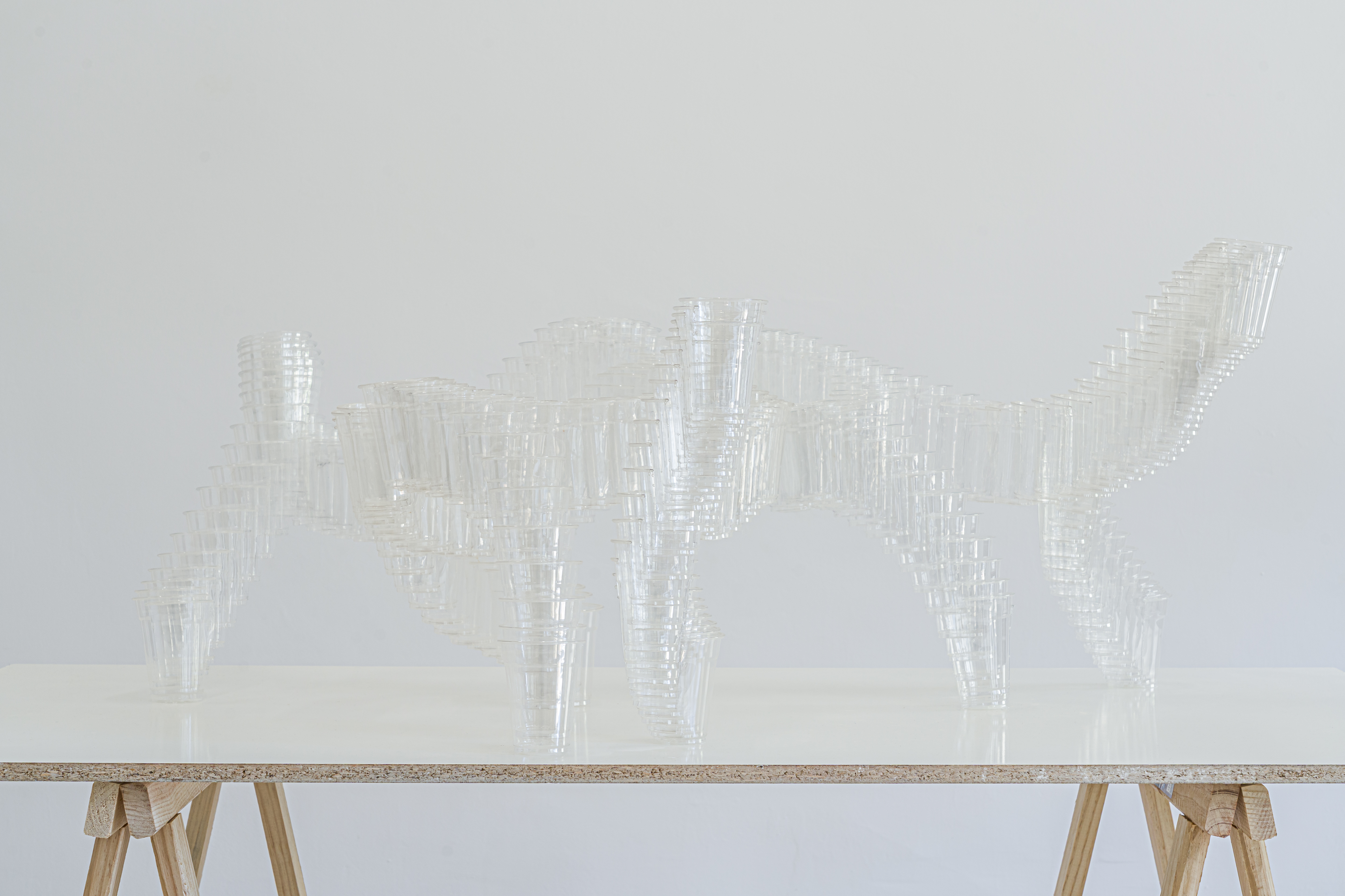 The London Toast, 2025PET Plastic cups, acrylic paint, silicone.48 × 120 × 66 cm.Installation view at Por, Digestivo, Madrid, 2025Photo: Alejandro Cayetano