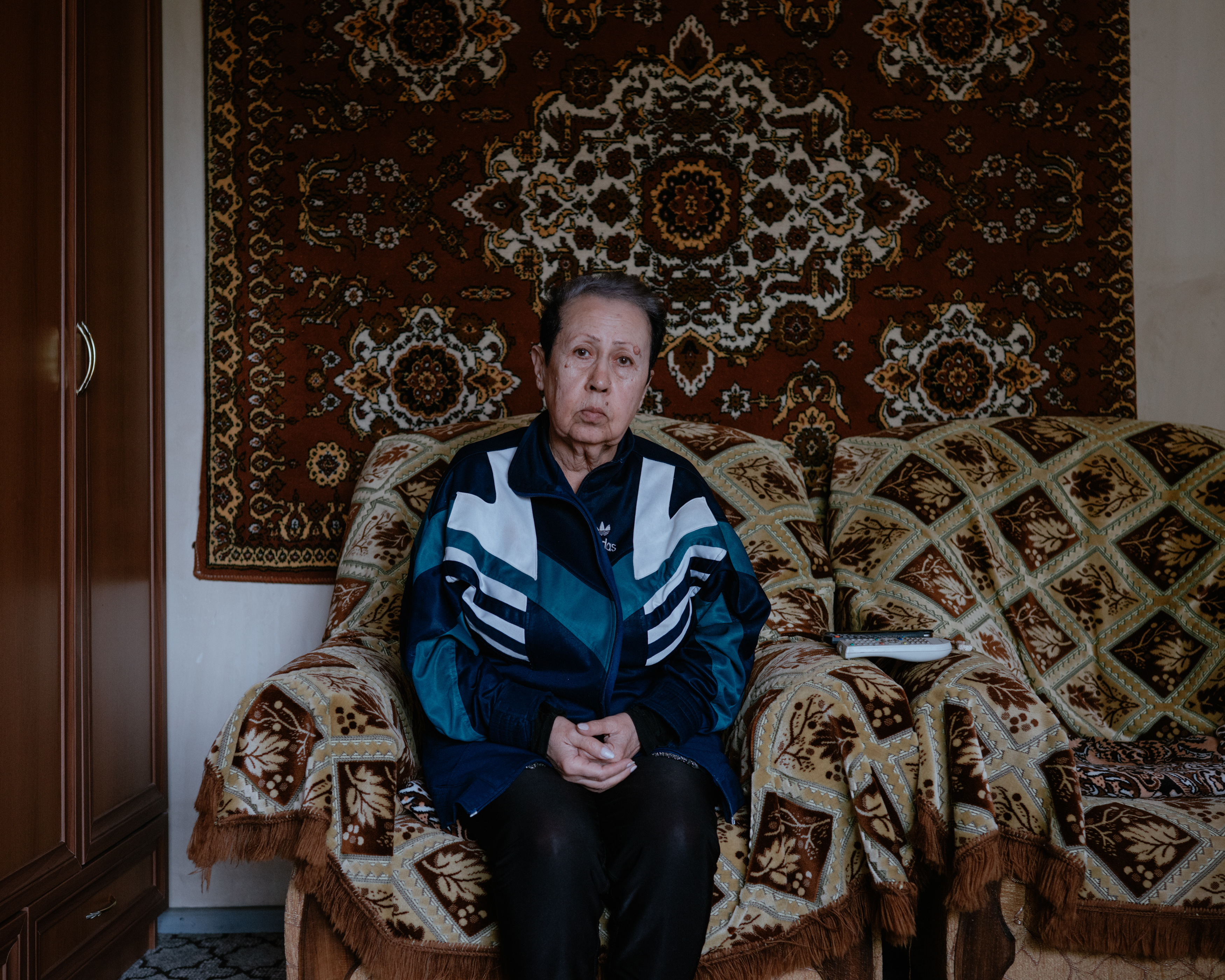 Seda, 78, in her apartment. She was born and raised as an Armenian in Baku and fled to Armenia amid ethnic violence in the late 1980s, before the collapse of the Soviet Union. She now lives in a town near Yerevan, together with other former residents of Baku.