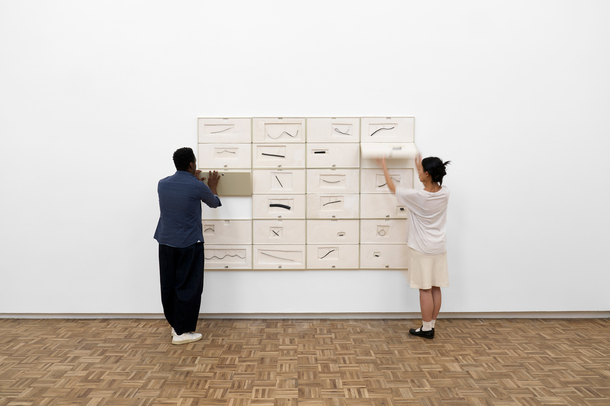 Jared Ginsburg, rubber index (2025) | Key cases, resin, string, jewellers wire, rubber, 152.5 x 215.5 cm