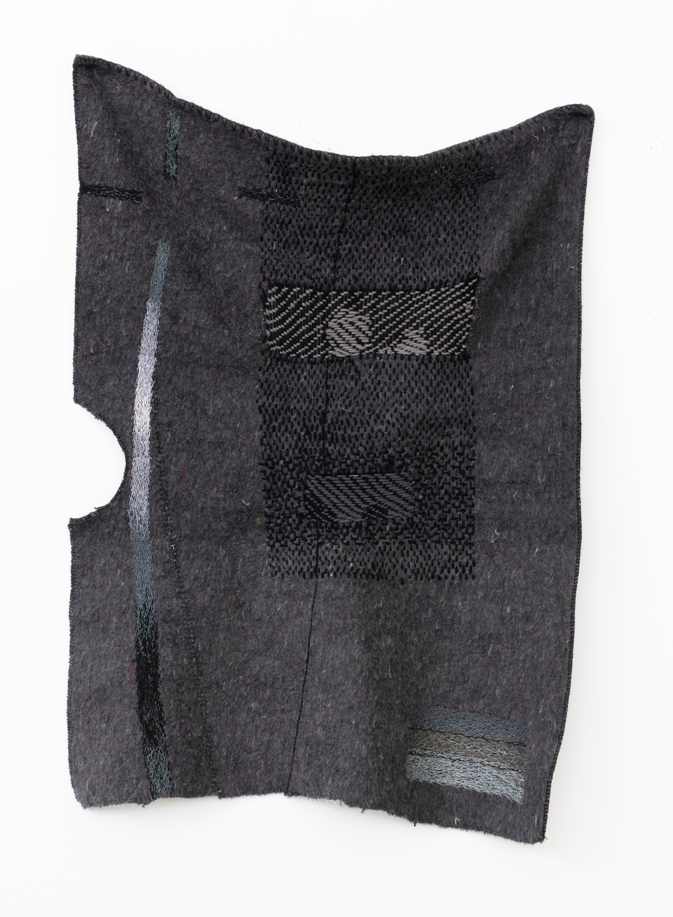 Mend 23. 2022. Wool, synthetic, and cotton embroidery and mending. 36" x 24". Photo by George Perez.