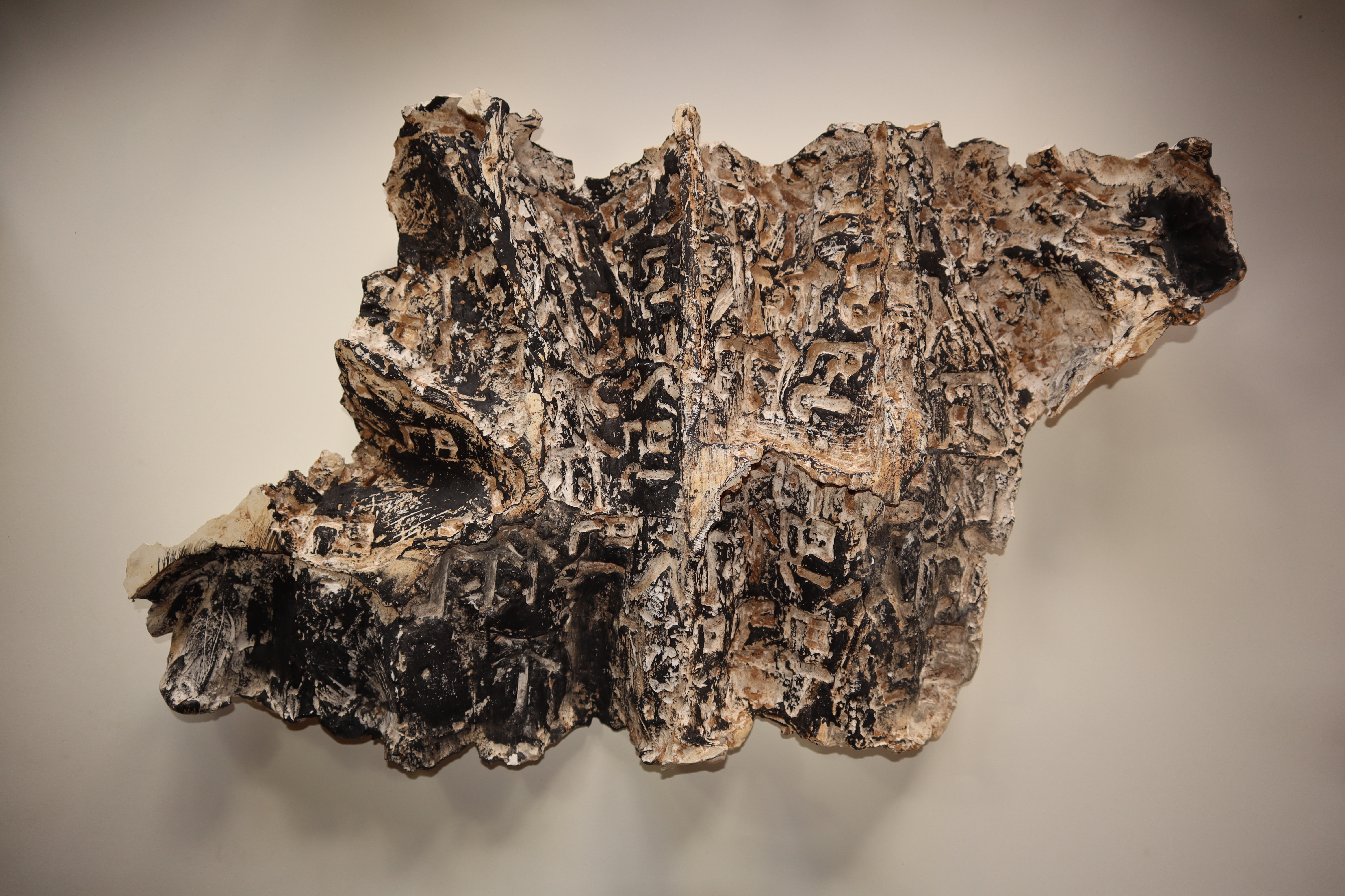 Tzung-Hui Lauren Lee, Mould for Identity Fragmented 2, 2021, plaster, Sumi ink, clay. 40cm x 30cm x 6cm