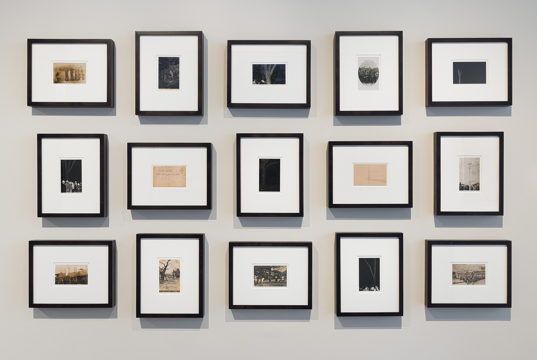 Ken Gonzales-Day, Erased Lynching Series #1, 2006. 15 framed chromogenic prints, mounted on cardstock, 6 x 3.75 or 3.75 x 6 inches each. Courtesy of the artist and Luis De Jesus Los AngelesPhoto by Etienne Frossard.