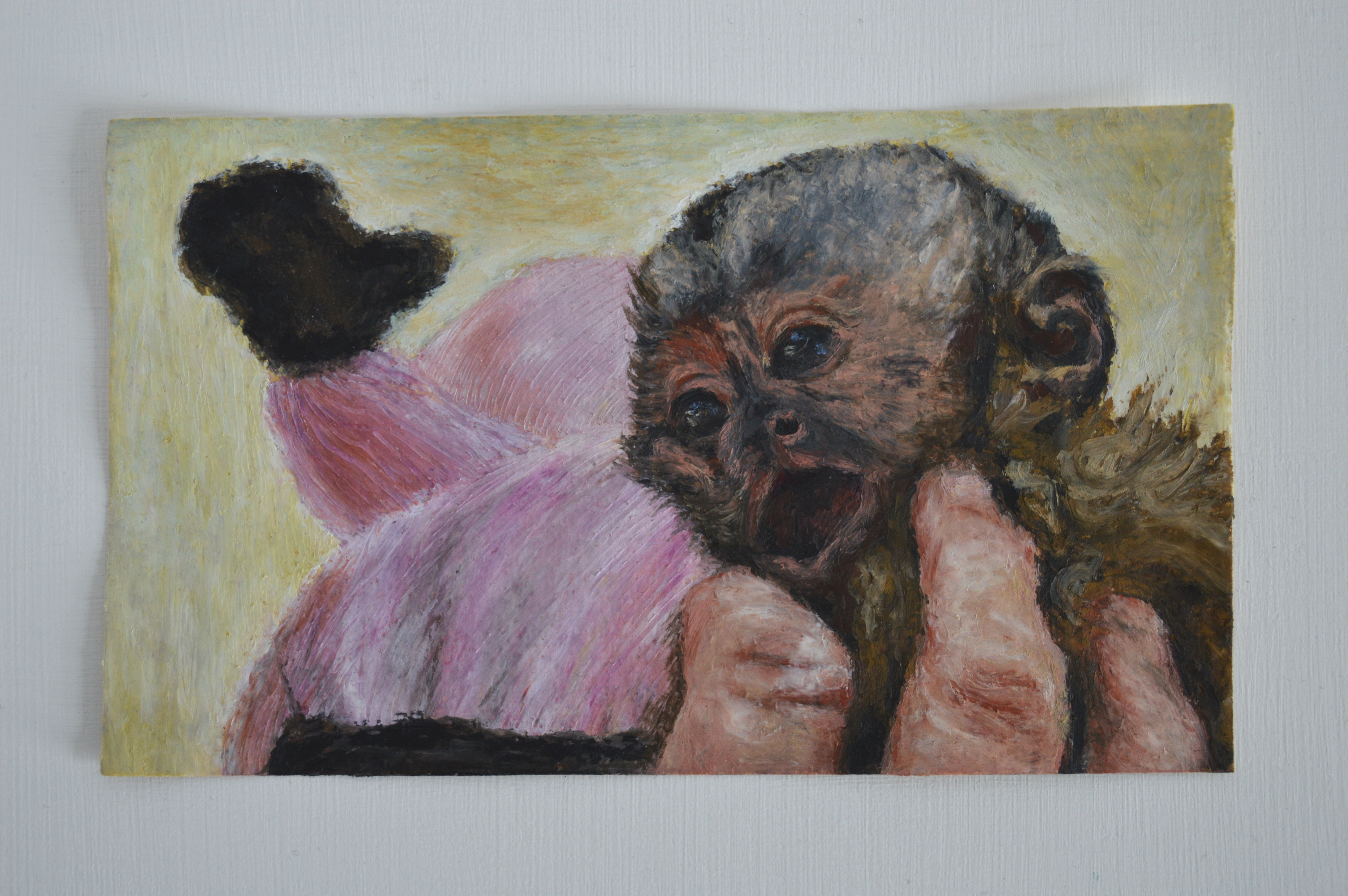 he's smiling   oil pastel on khadi paper, 9 x 15 cm 