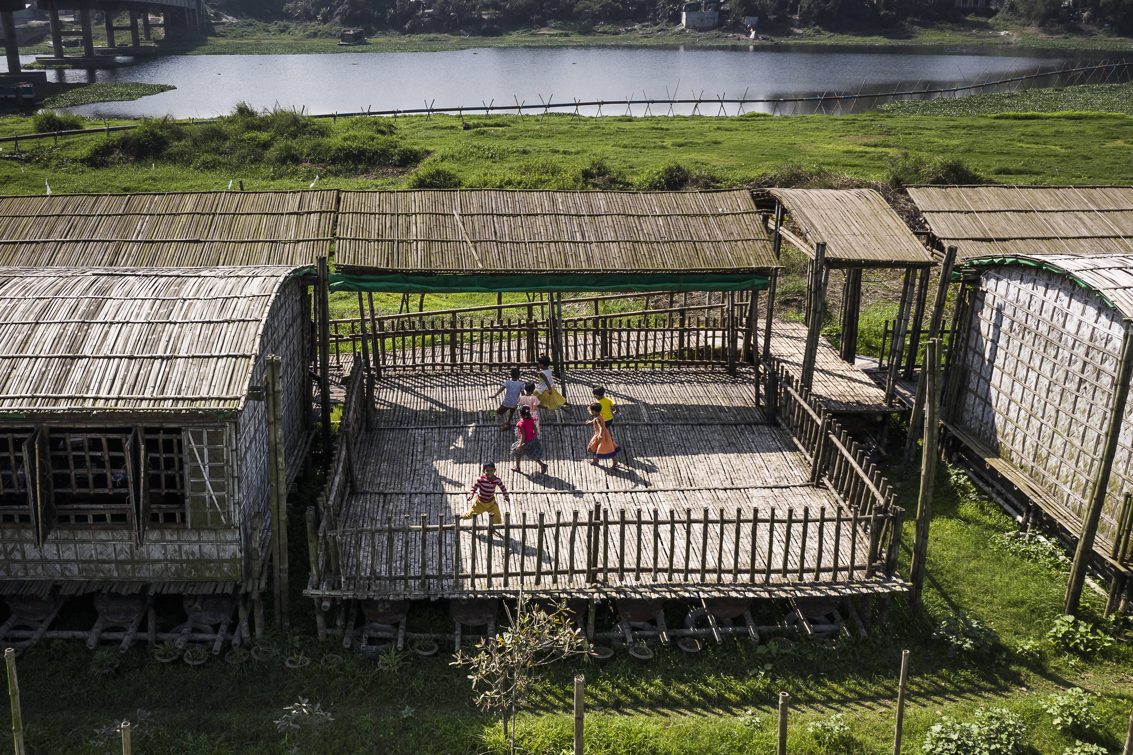 Children playing on the terrace. / Photo © Aga Khan Trust for Culture / Sandro di Carlo Darsa
