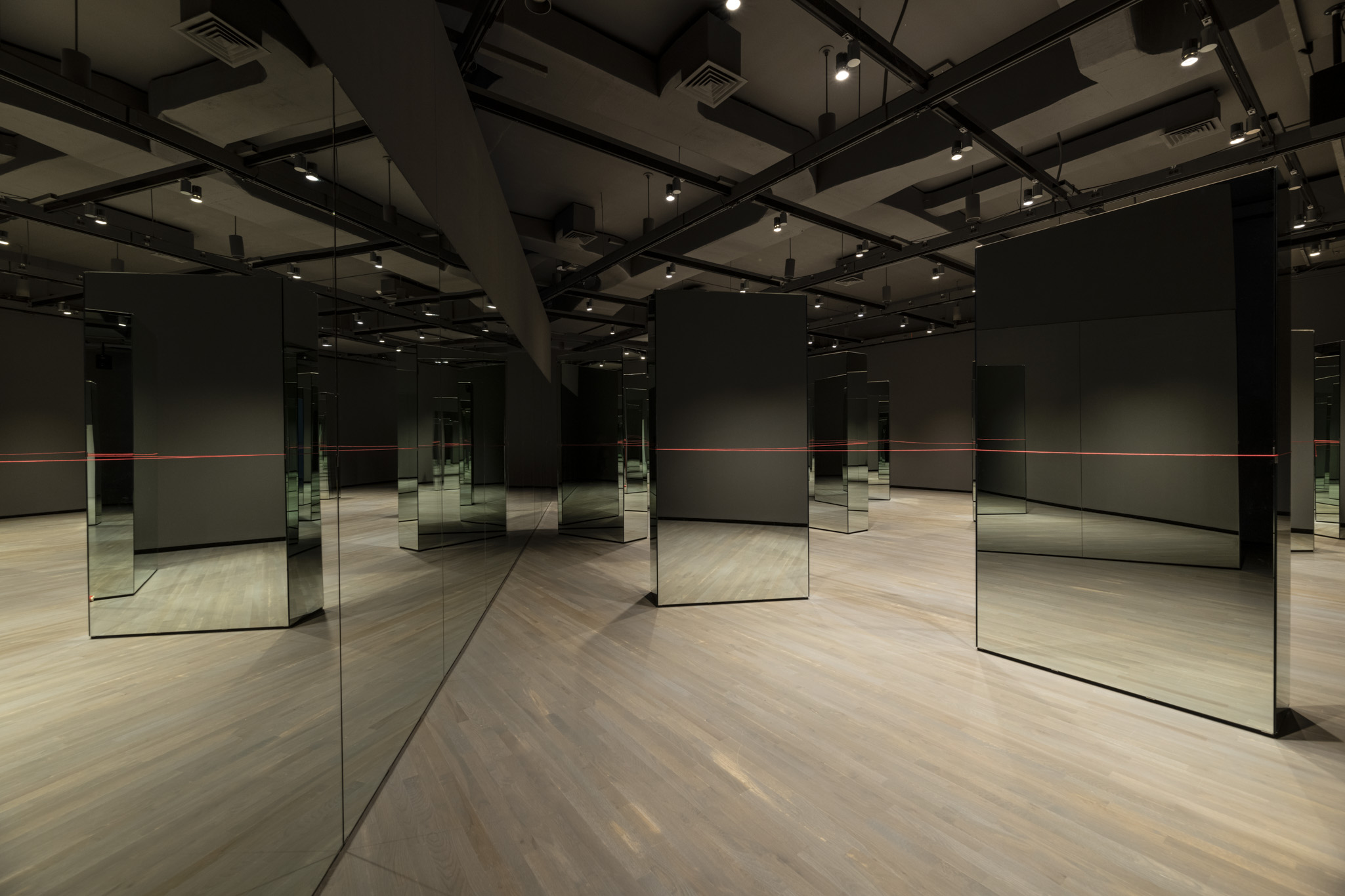 Installation view: Carmen Papalia, Red String (2015-ongoing), courtesy the artist. Walter Phillips Gallery, Banff Centre for Arts and Creativity. Photo by: Jessica Wittman.
