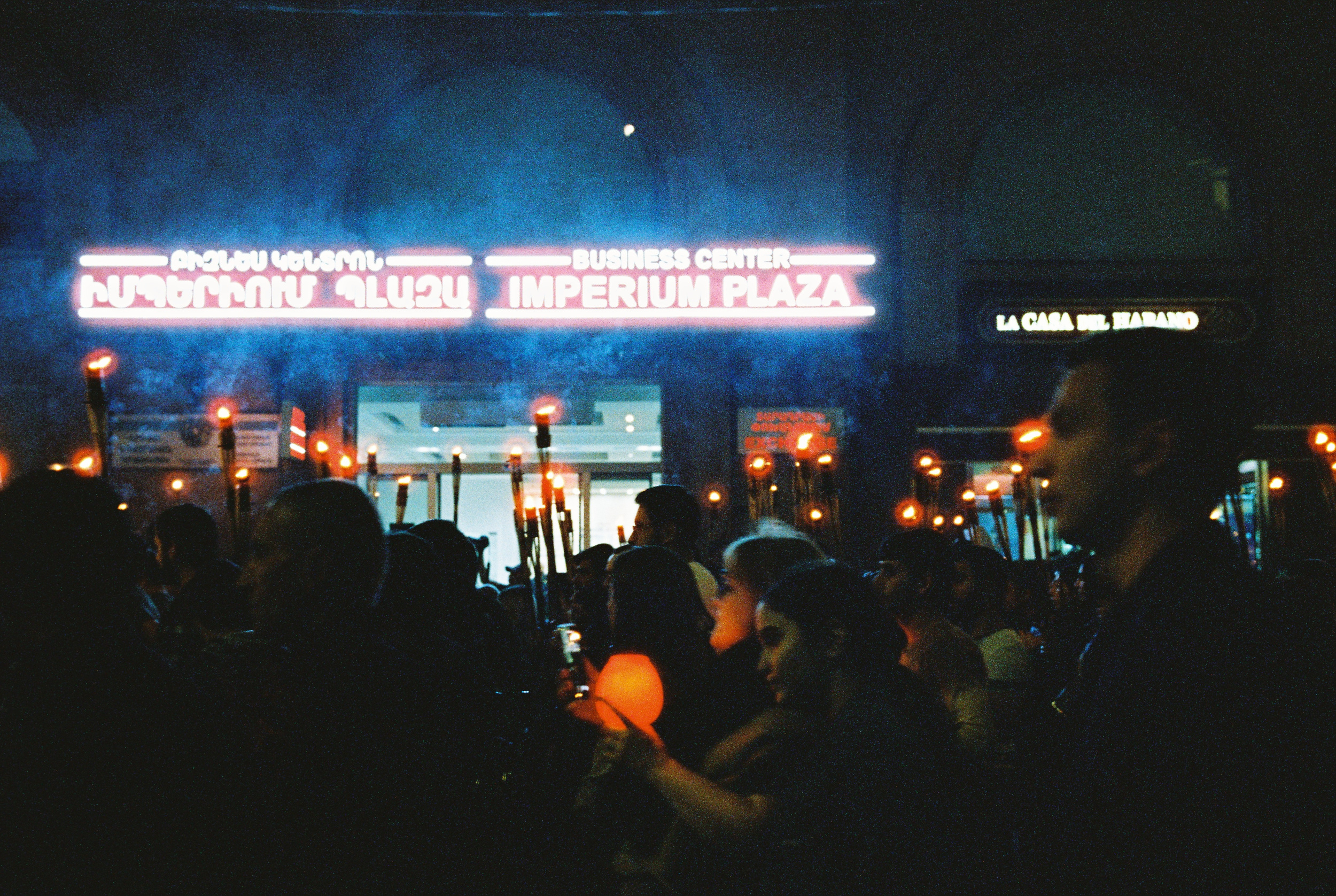 Walls of grievers travel as one throughout Central Yerevan. Cinestill 800T.