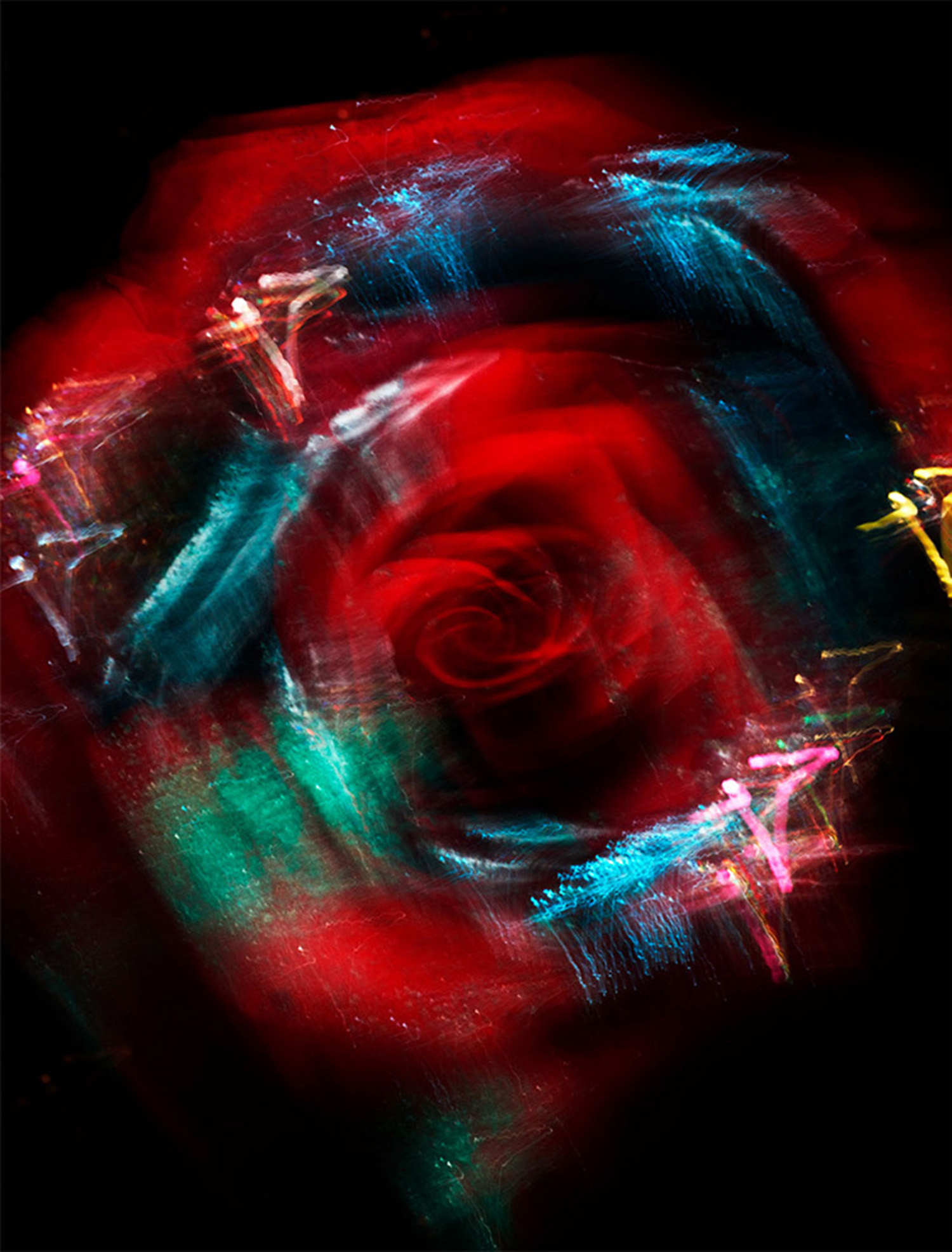 KMA stylist Sara Wacksman designs set for a conceptual photo of a red rose with colorful sparkles on the petals 