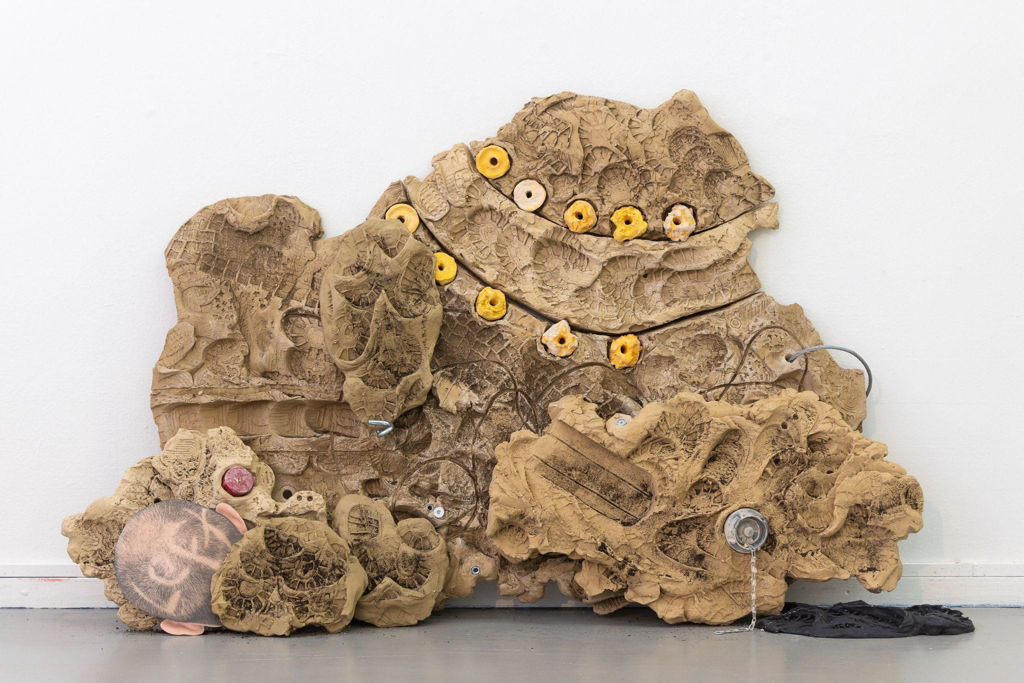 Rodrigo Red Sandoval, Hill peek (taking pieces of a walk for a run), 2021, dirt, clay, jesmonite, metal, electric plugs, water plugs, wire, digital print on alubond, 190 x 110 x 130 cm. © Rodrigo Red Sandoval. 