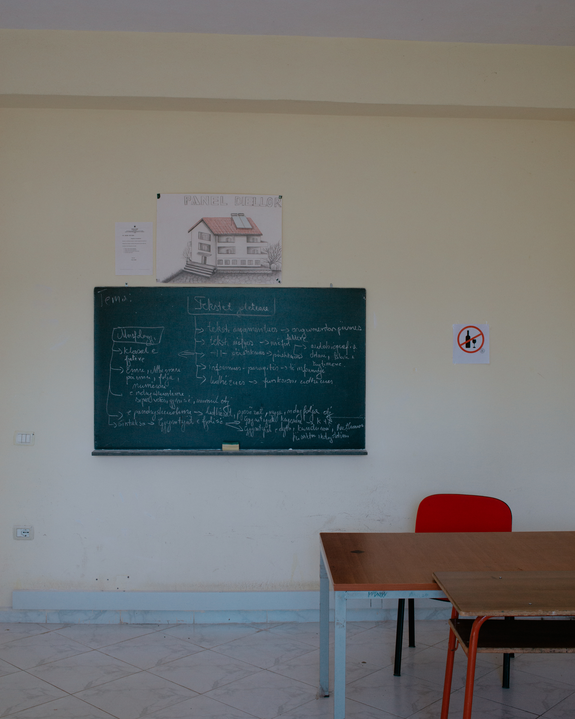 Explanations about the Albanian language are written on the board
