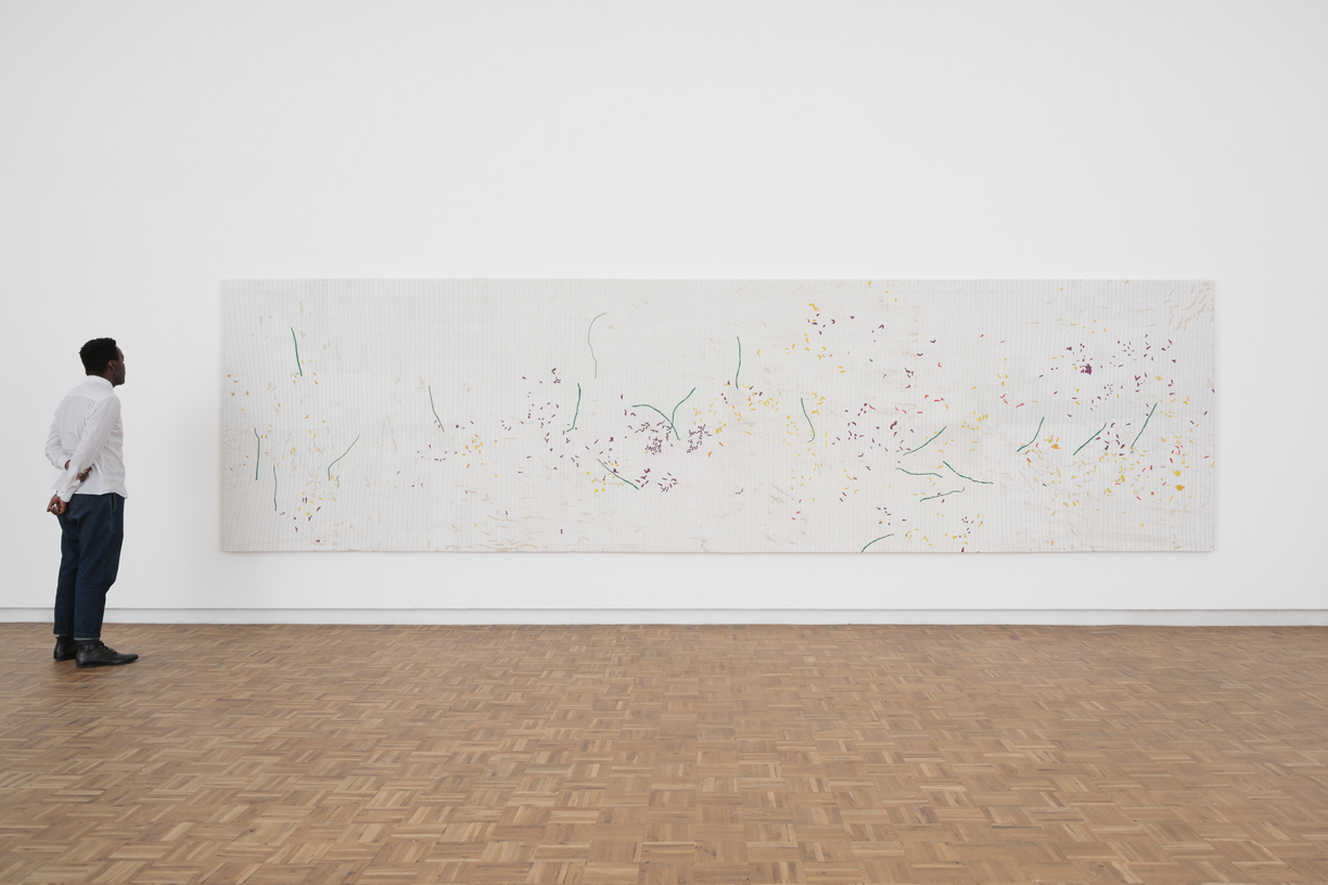 Asemahle Ntlonti, Restlessness (Ndizinze phi?) (2025) | Acrylic paint, paper, acrylic gel, and leno thread on canvas, 170 x 621 x 5 cm 