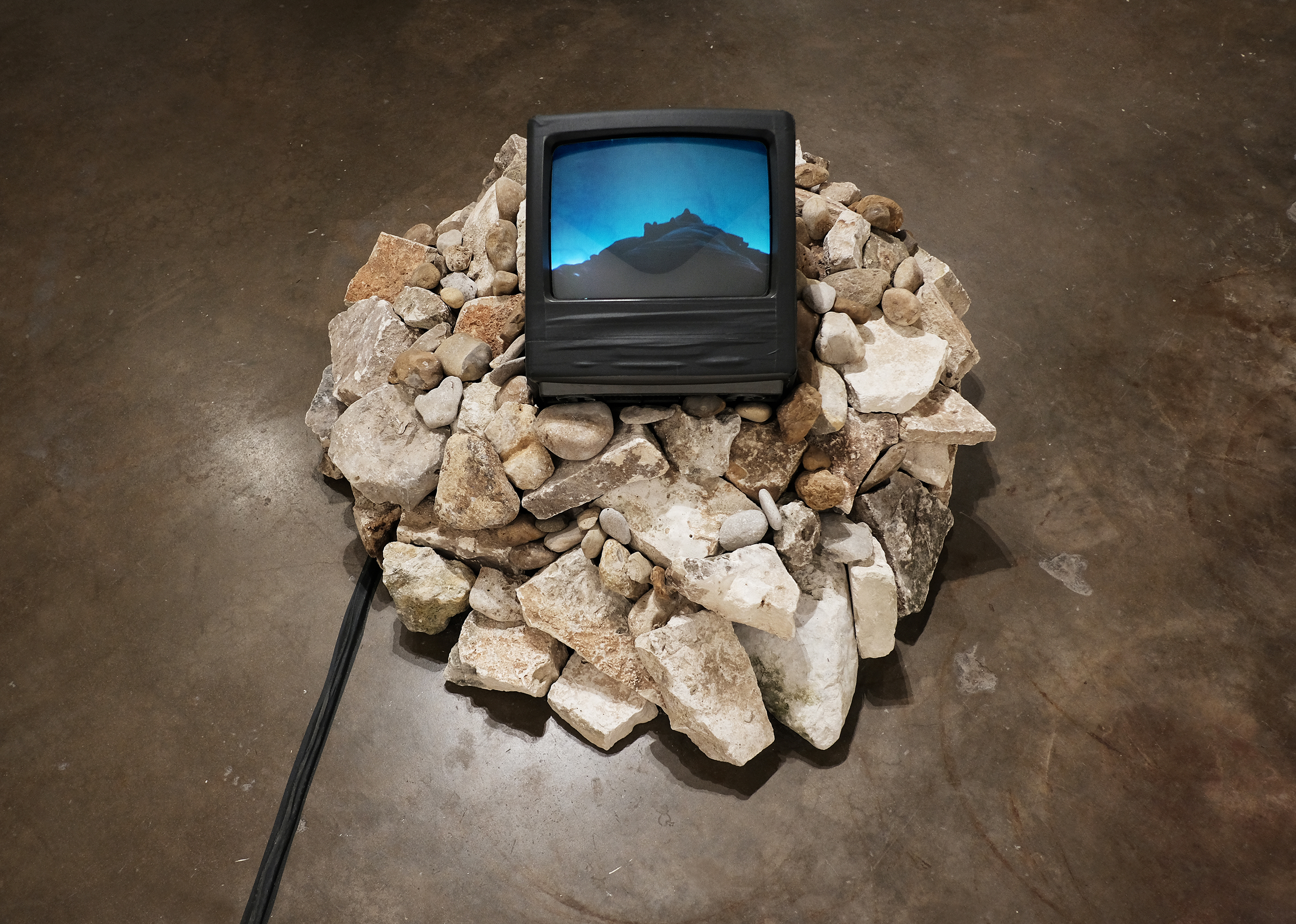 i am a mountain video, monitor, rocks 2017. Photo credit: Erica Robert Pallo