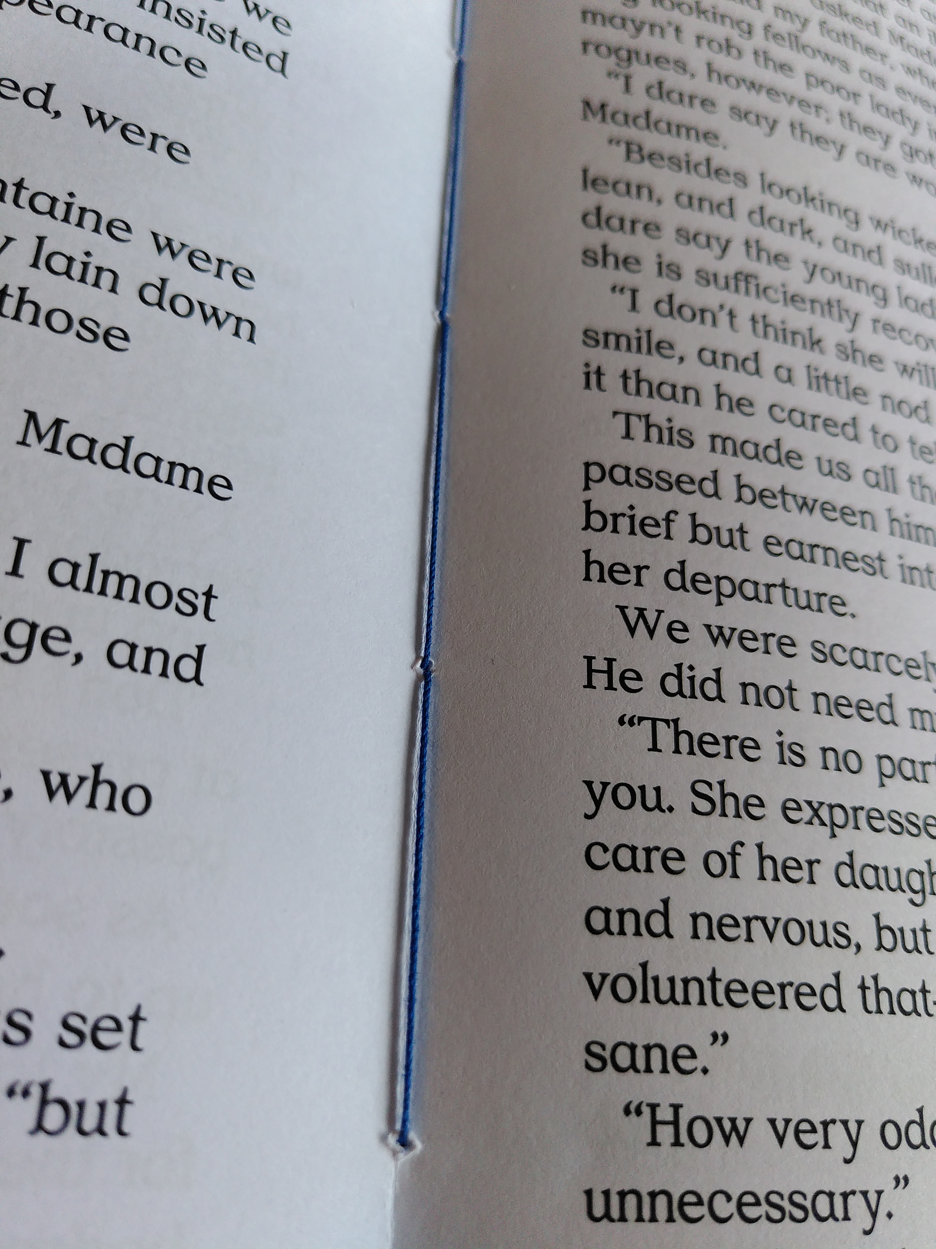 a close-up of the deepblue binding inside the booklet