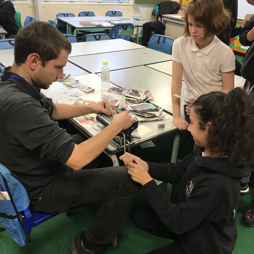 Jack Fawdry–Tatham running a printmaking workshop using a pastamaker at a nearby primary school.