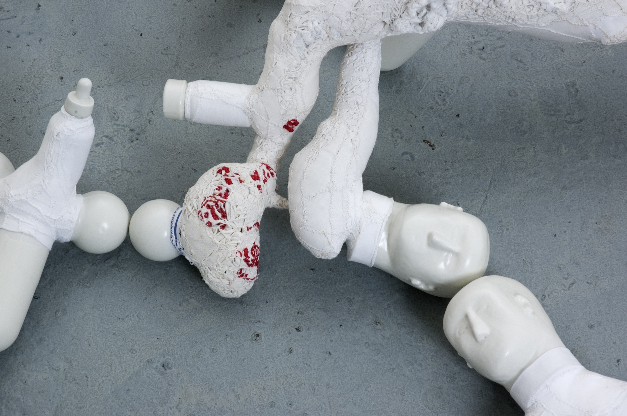  Ex-Votos, 2006/2007 (detail) . Glazed porcelain and various fabric embroidered with cotton thread . Sizes and dimensions variable. 