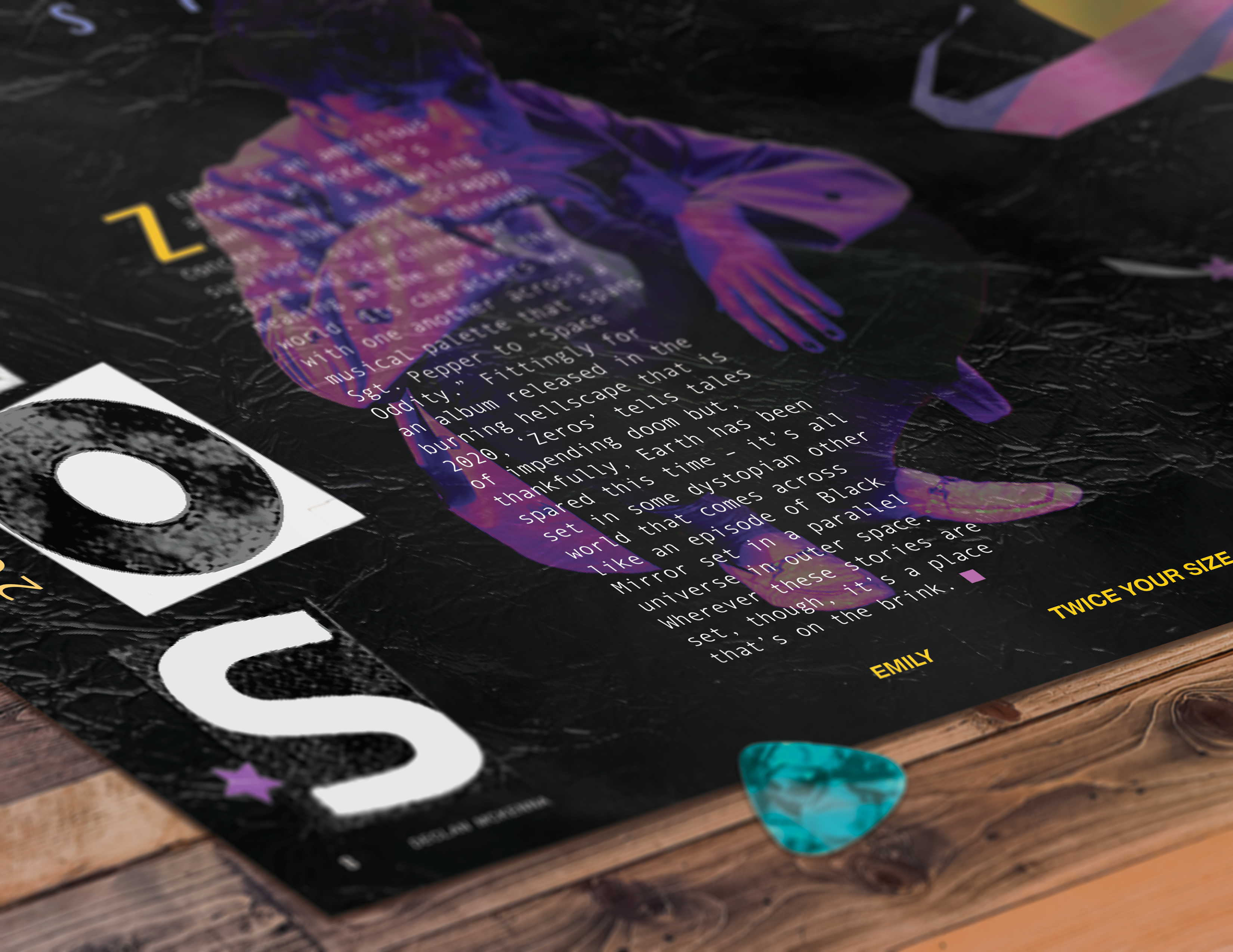 Close-up of a corner of the Zeros spread on a wooden table.