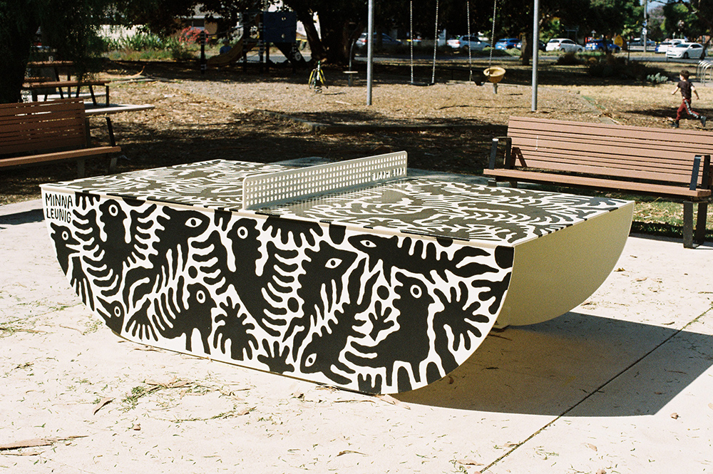 A POPP outdoor table tennis table with artwork by Minna Leunig