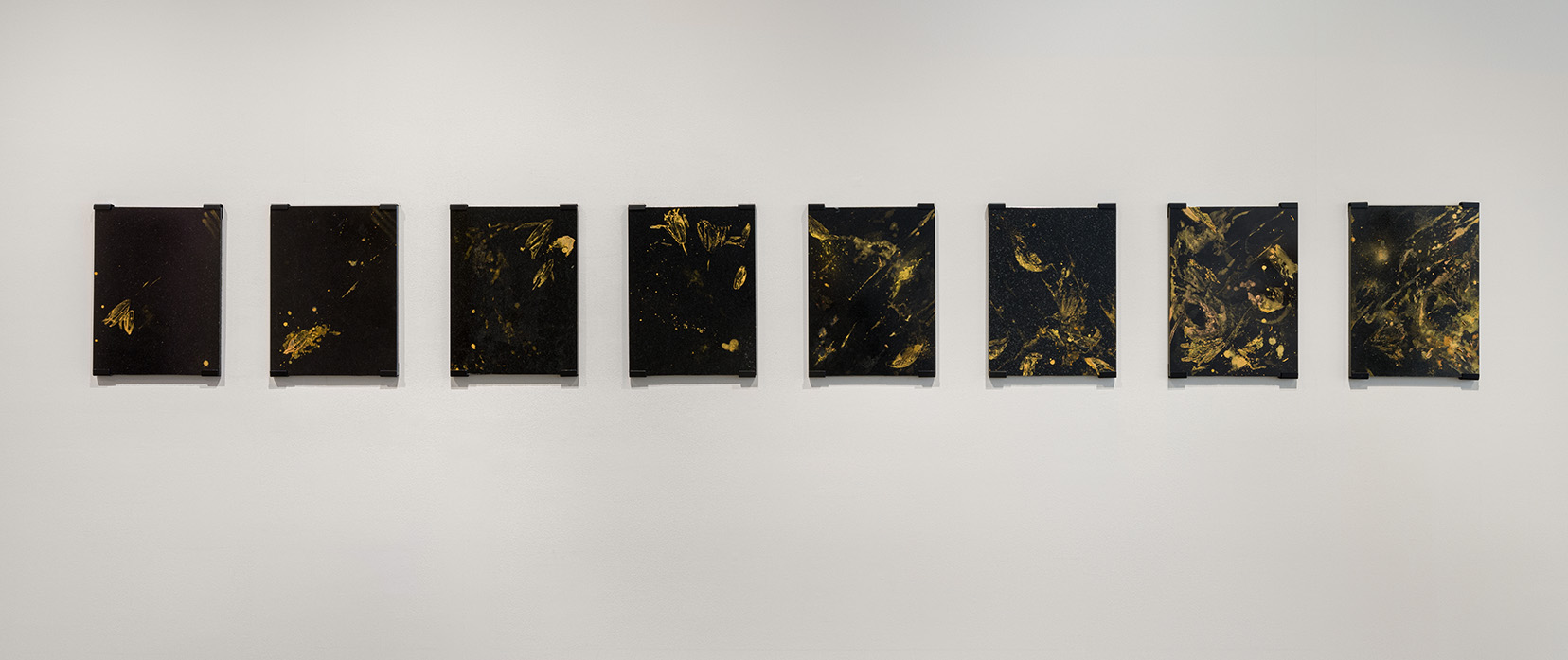 Joseph Liatela, "Untitled (for Pulse) Series," 2022 & 2023, eight lily pollen and pigment on granite tile, 12 x 16 inches. Photo by Etienne Frossard. 