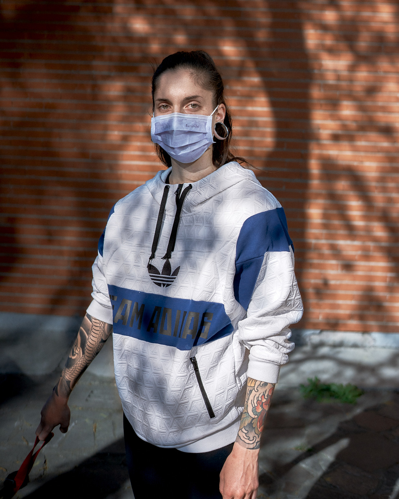 Young Woman Walking Her Dog, Milano, April 2020