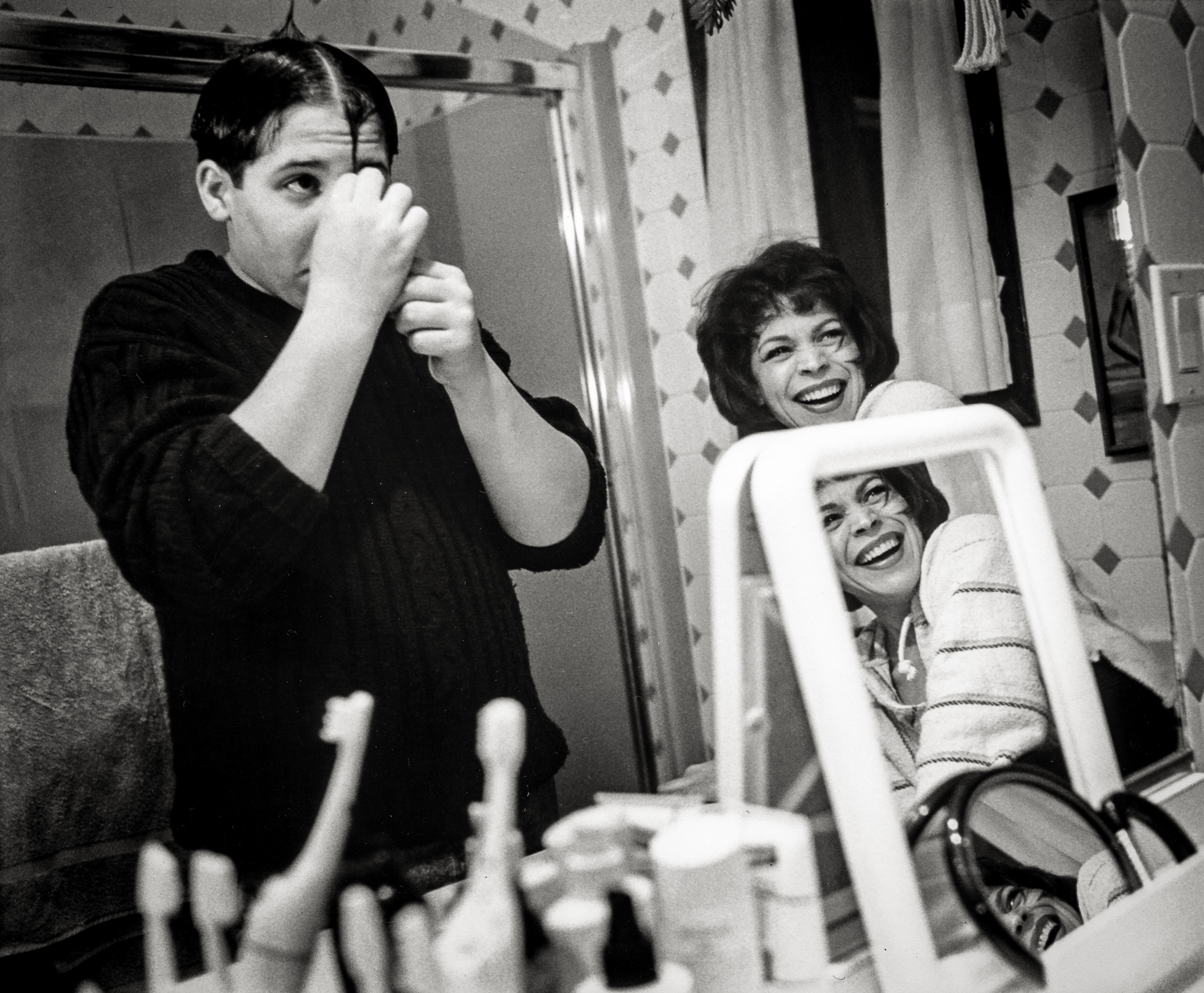 A single mother, Diane sought to protect her sons by shielding them from the effects of her treatment, at a price of losing the understanding she needed. Still, each helped in the way he knew. Her son Ari bolstered her spirits with his antics.