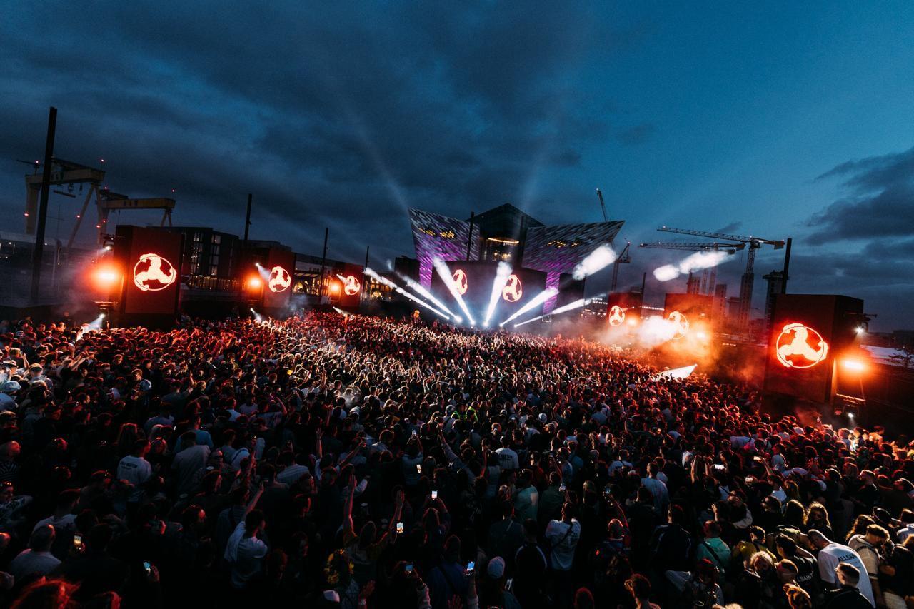 Huge crowd at AVA Festival 2025 in Belfast Titanic Quarter with stage lights and visuals