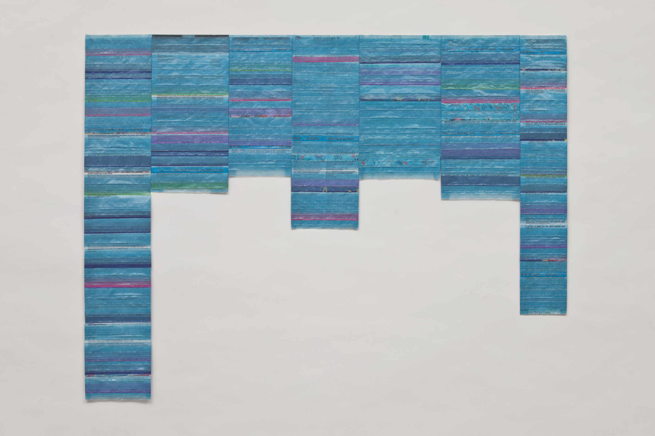  Blue litany, 2013 . Medicine information leaflets, fragments of cloth, double tape and transparent blue paper. 65 x 80 cm . Private Collection, Goiânia, Brasil