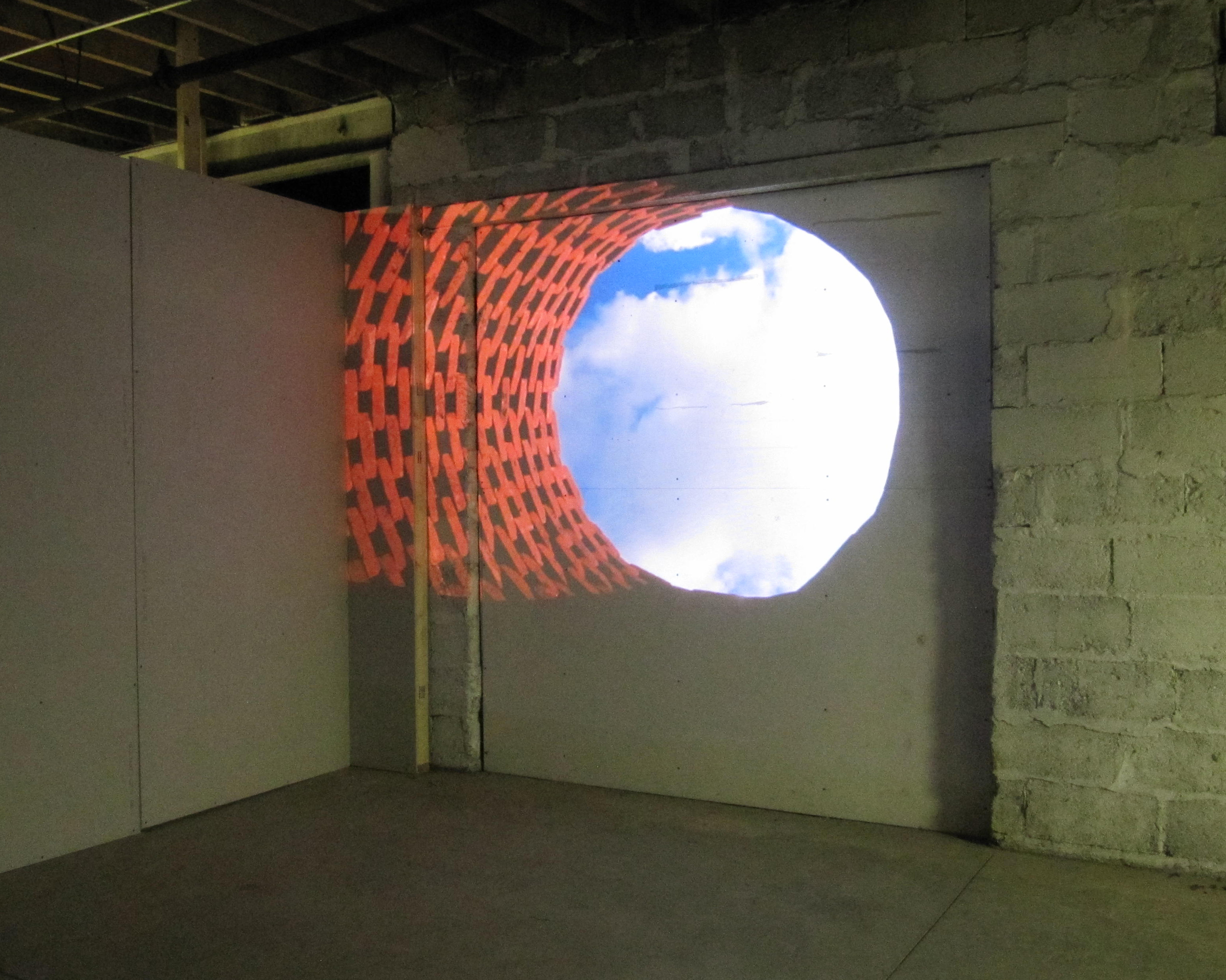 From In Here, To Out There, sizes variable, projection, 630 bricks and sky