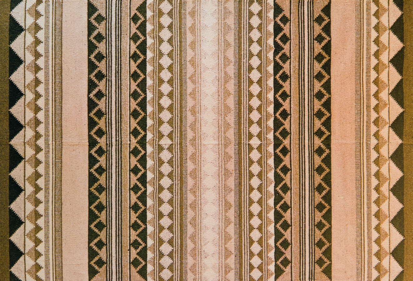 Handwoven wool rug. Serial production. 1980's