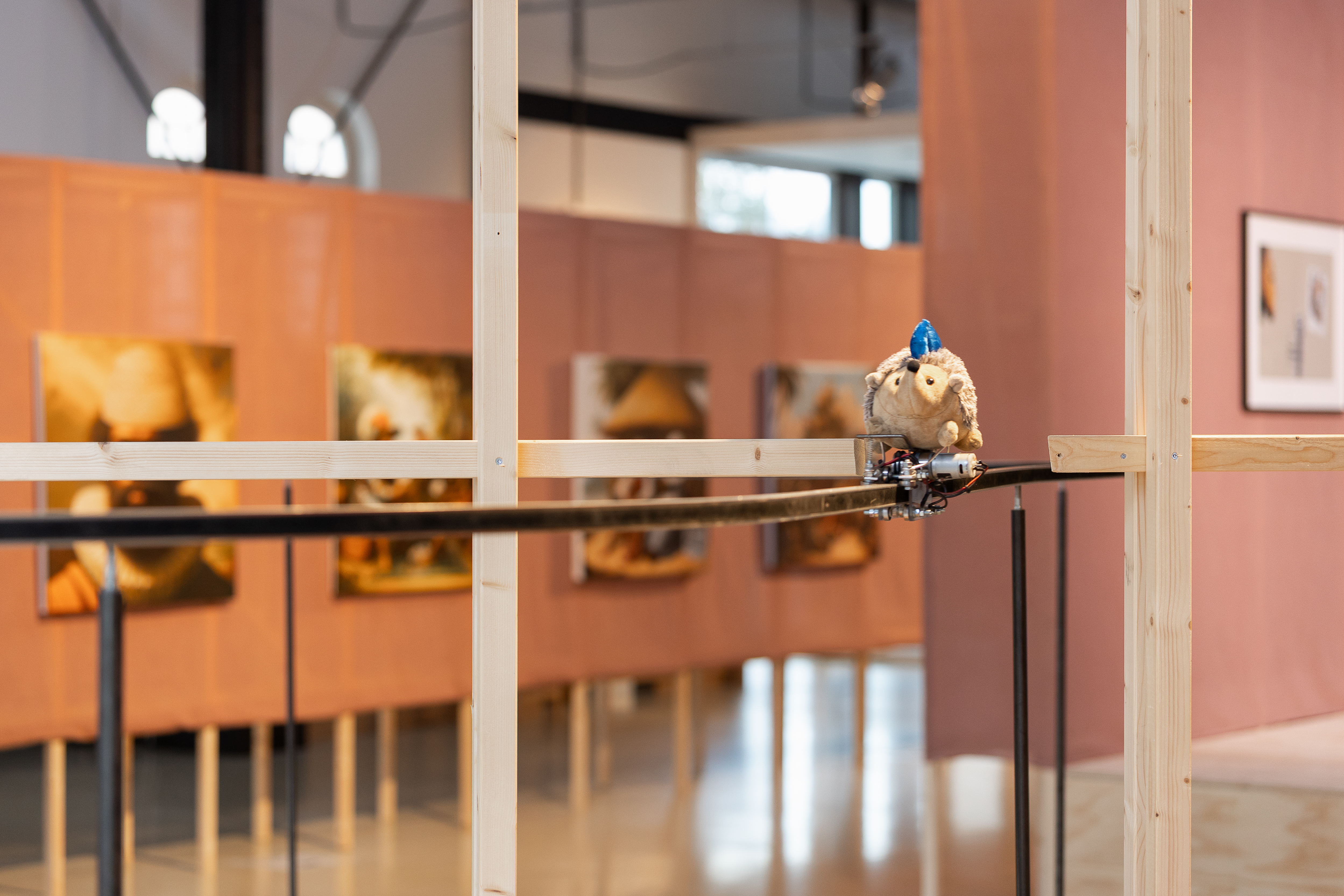 TrainHedgehog plushie, motor, MDF, steel, stainless steel, electrical parts, mixed media Dimensions variable 2022