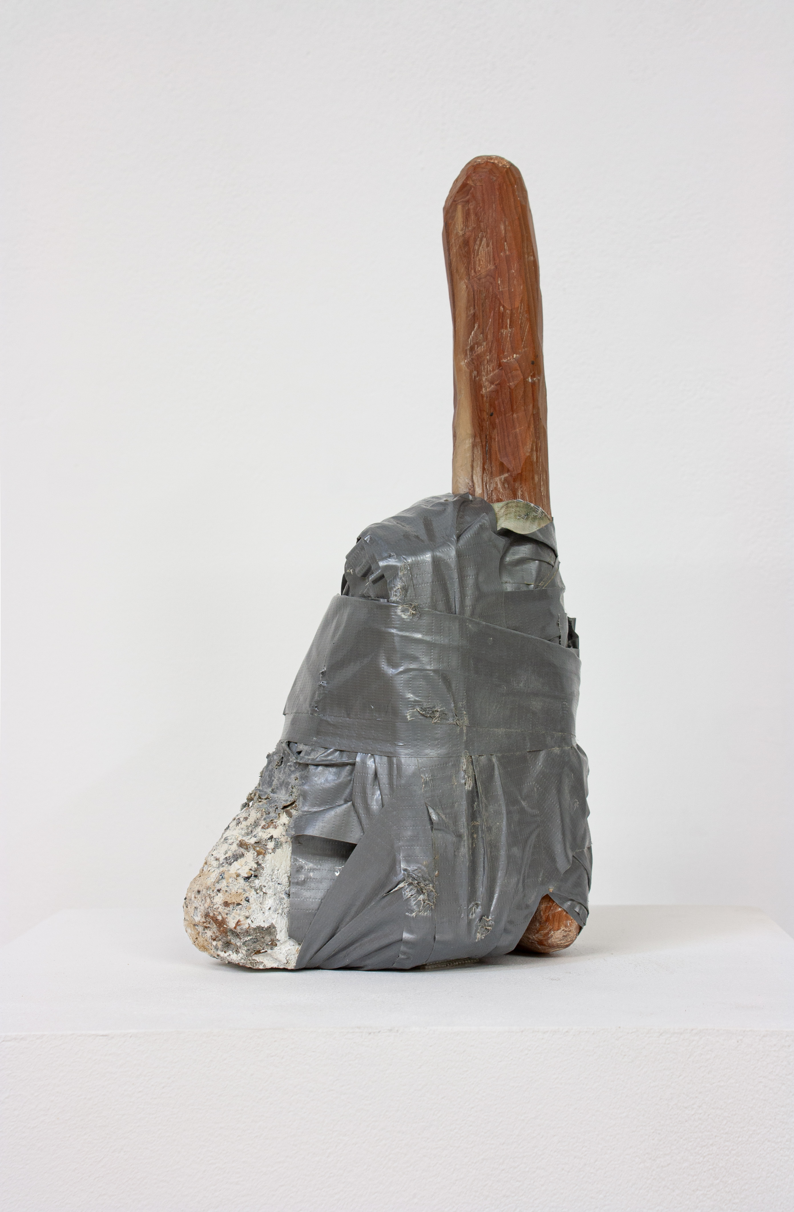Hammer, 2019  Yew, concrete, tape  35 x 18 x 9 cm