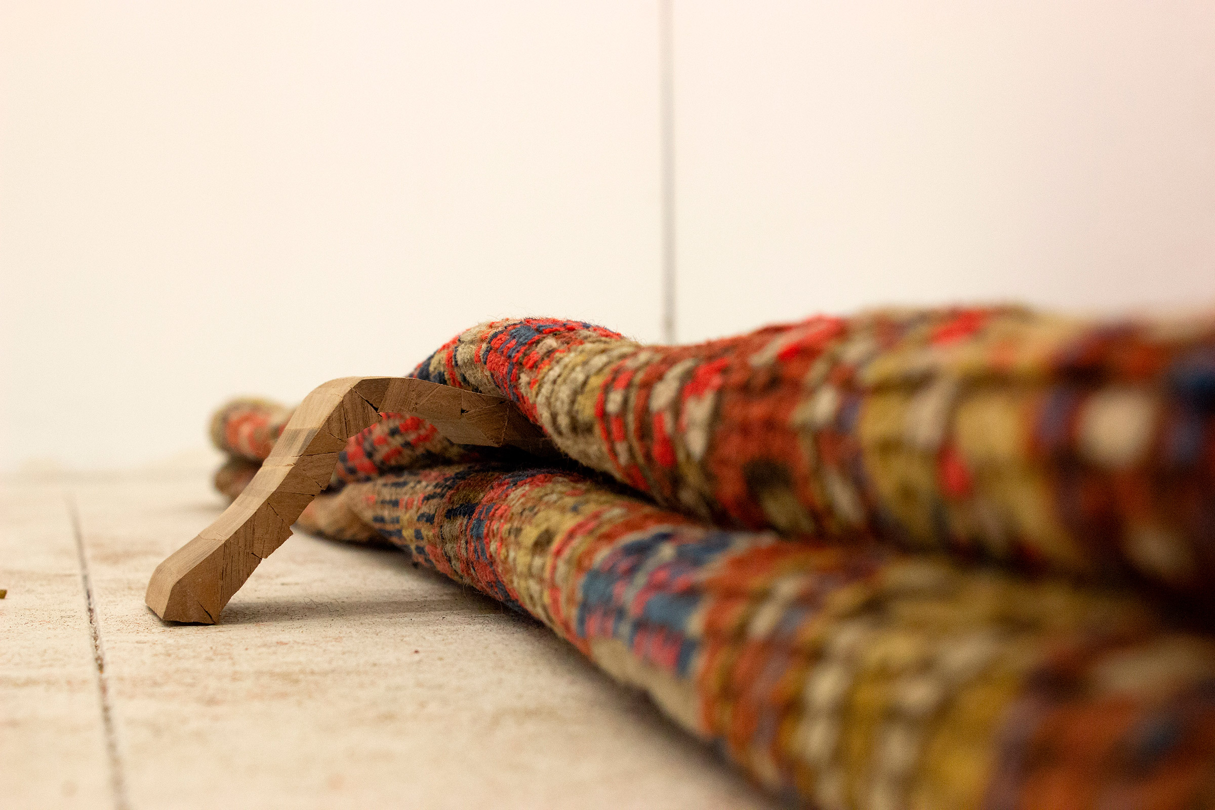 detail carpet and wooden objects, 150cm high by 4cm