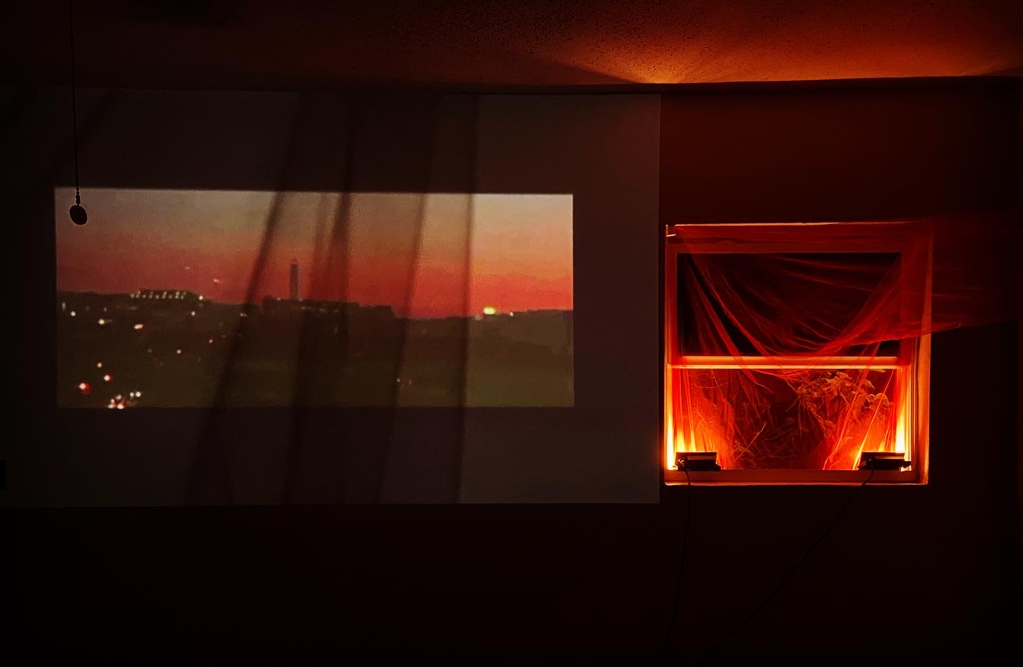 Heaven on the 8th Floor, interior installation view, video, tulle, light 