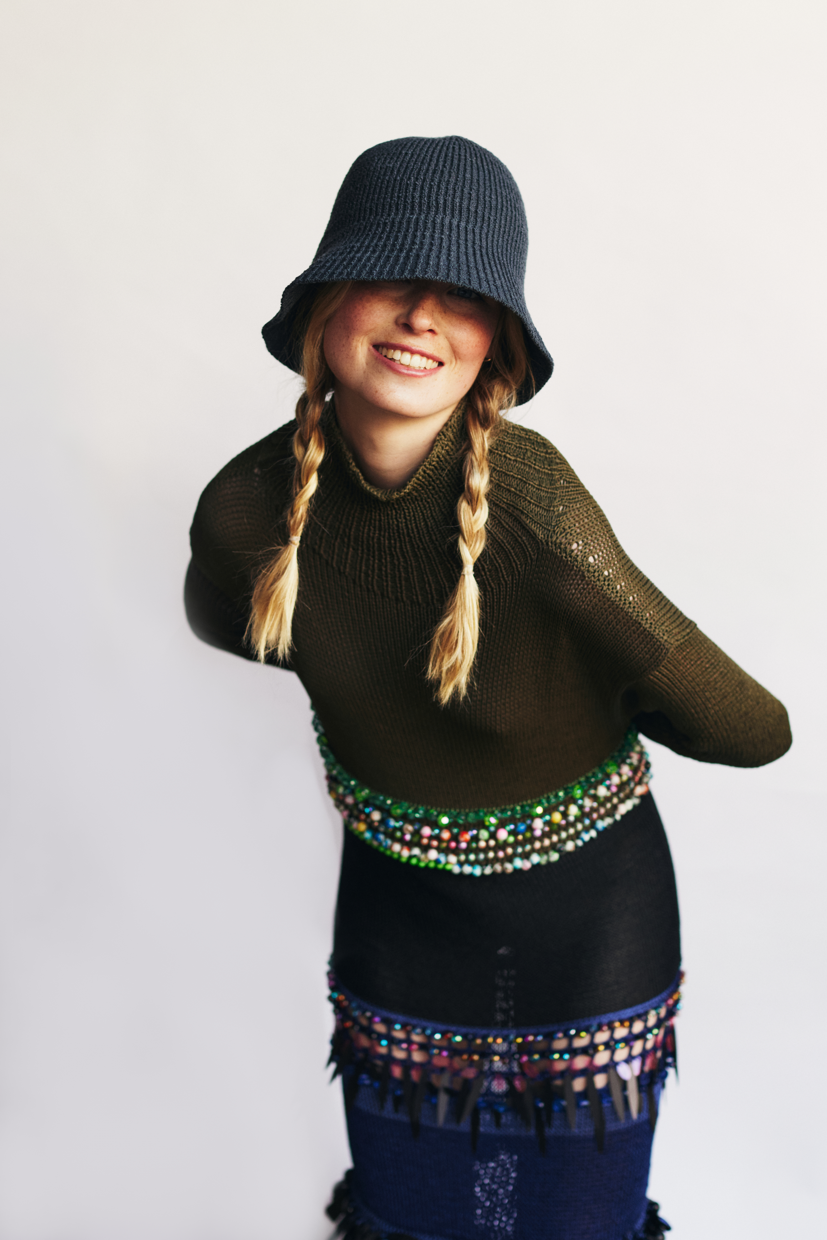 Stylish fashion editorial photoshoot in Dublin, Ireland, featuring a beautiful model unique pieces by Irish fashion designers. Photographed on a farm in Ireland, featuring horses and other farm animals. Photographed for Image Magazine by Alex Sheridan, with fashion stylist Anne O’Shea.