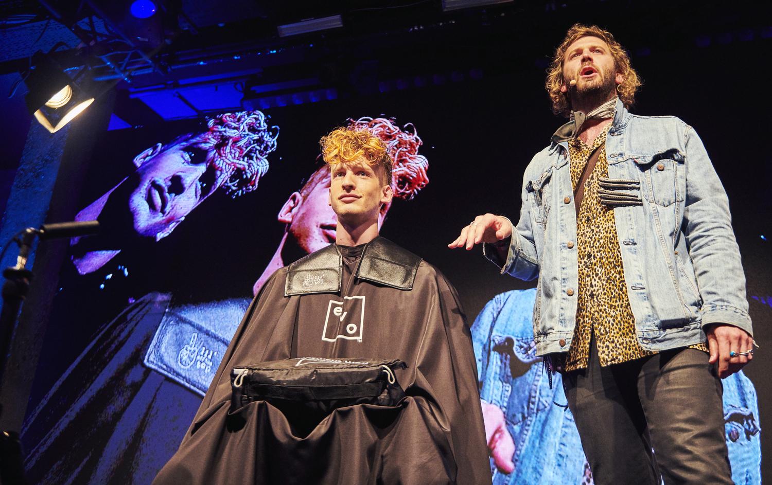 Live hairstyling demonstration on stage at EVO Hair “Don’t Buy This” event in London.