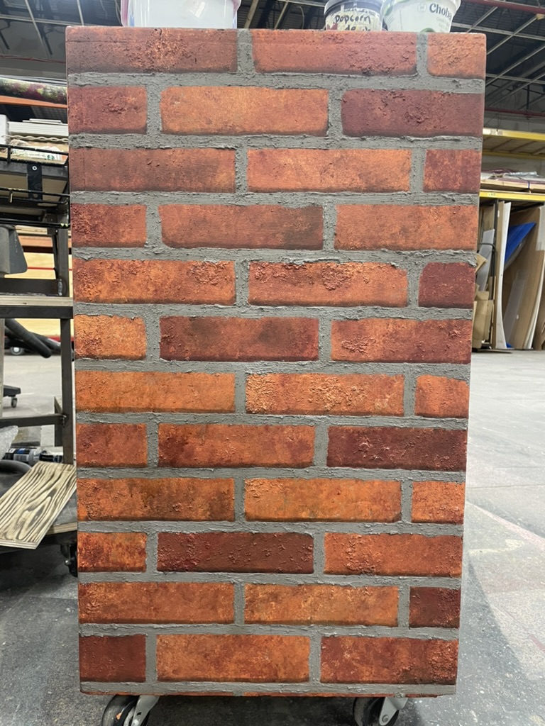 Adding additional textured grout and shadowing individual bricks
