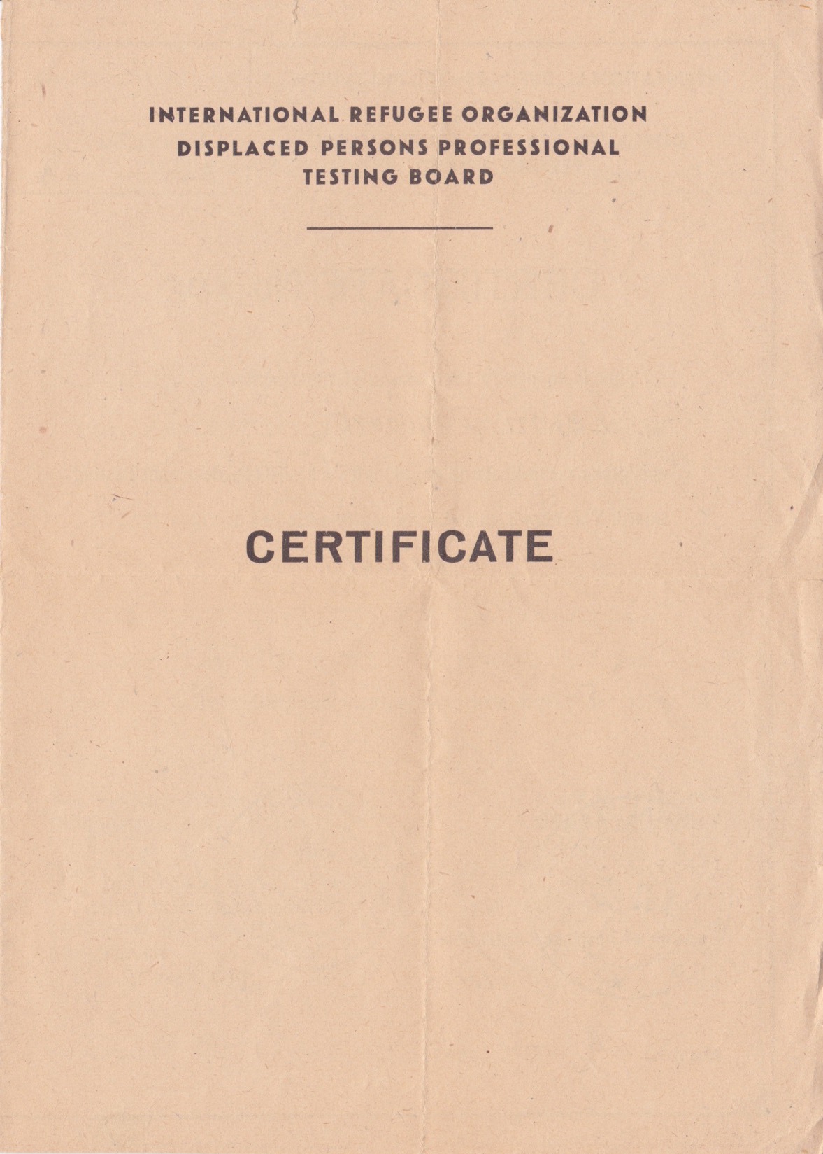 Header page for Bert's certificate of successful completion of professional testing by the IRO (International Refugee Organization) an org. founded in 1946 to respond to the massive refugee crisis throughout Europe.
